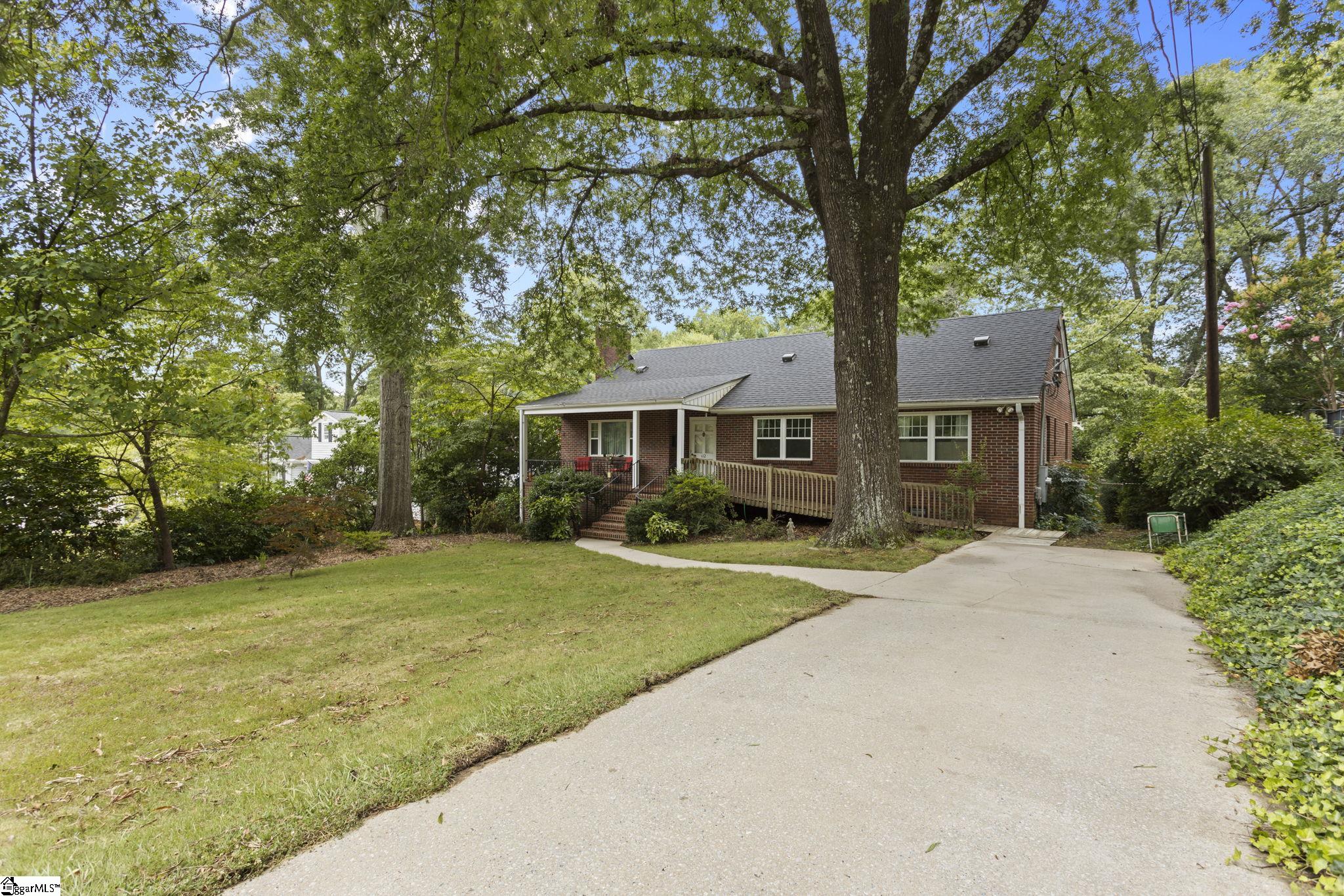 Fantastic opportunity at a new price with tons of potential, this walk-out basement home sits beneath the 100-year-old oaks on one of Greenville's most desired streets. This 3 bedroom 2 bath home is ready for its next owner to bring it back to life! The main level includes 3 bedrooms and 2 baths, including an ensuite with the primary bedroom. The finished upstairs extends the entire length of the home and provides a bonus space that could be used as a 4th bedroom or office/playroom. The unfinished basement provides the option for significant storage space or could be converted into finished space. From the basement you can walk out onto the brick paver patio overlooking the inground pool! Within the last 12 months, 3 properties have sold on this street and the connecting street. One lot sold for $600,000, and two houses for $1M and $925k. Don't miss your opportunity to snag a home in this highly prized area of Augusta Rd!