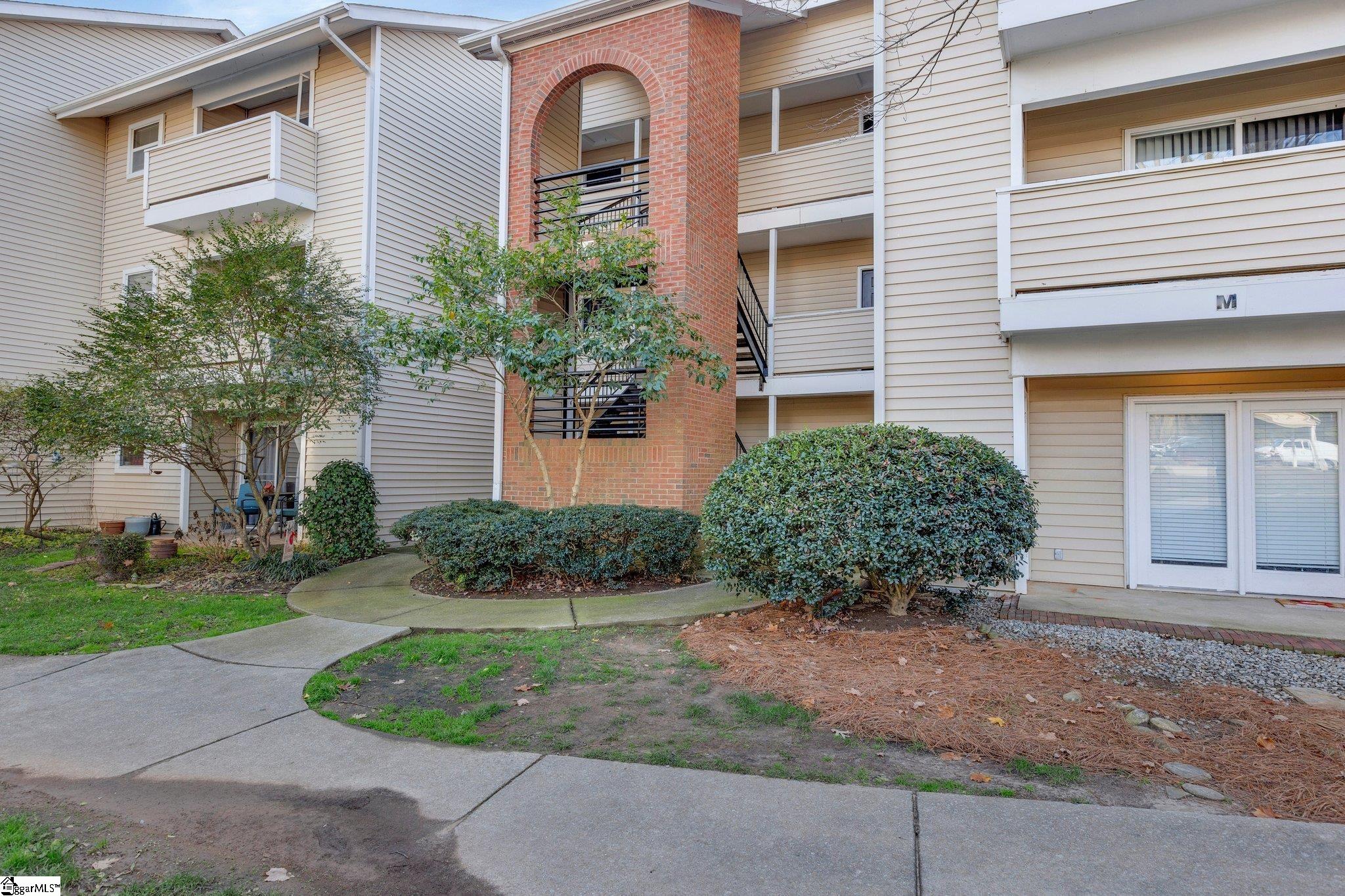 Welcome to 2601 Duncan Chapel Rd, Unit M301, a charming 2-bedroom, 2-bathroom condo perfectly situated in the heart of Greenville, SC. This third-floor unit features an open-concept layout with vaulted ceilings, creating a bright and airy living space. Step out onto your private balcony to enjoy serene views and a quiet retreat after a long day. This condo offers two spacious bedrooms, providing ample room for relaxation and personal space. The well-appointed kitchen flows seamlessly into the dining and living areas, making it perfect for entertaining or cozy nights in. The community is rich with amenities, including a sparkling pool for hot summer days and convenient lawn and exterior maintenance, ensuring a low-maintenance lifestyle. Located directly behind Furman University, the property provides easy access to the campus and is just minutes from the popular Swamp Rabbit Trail, perfect for outdoor enthusiasts. Don’t miss this opportunity to enjoy a peaceful yet connected lifestyle in one of Greenville's most desirable locations!