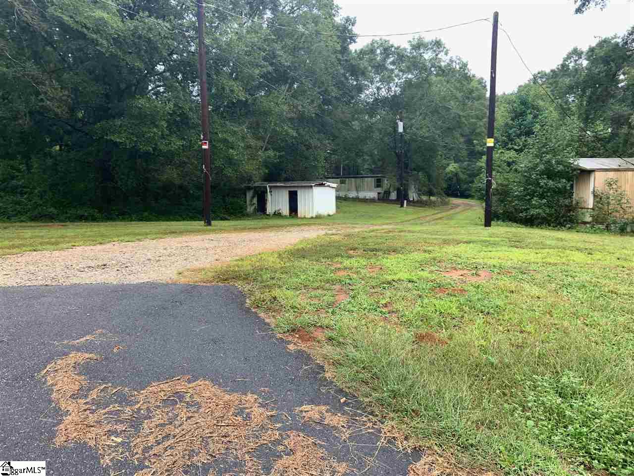 Call today and check out this property located in West Pelzer. The property was previously used for a Mobile Home Park. One tenant is still occupying the property. 3 water taps are located on the property. TMS # 2430504008, 2430408001, 2430408010