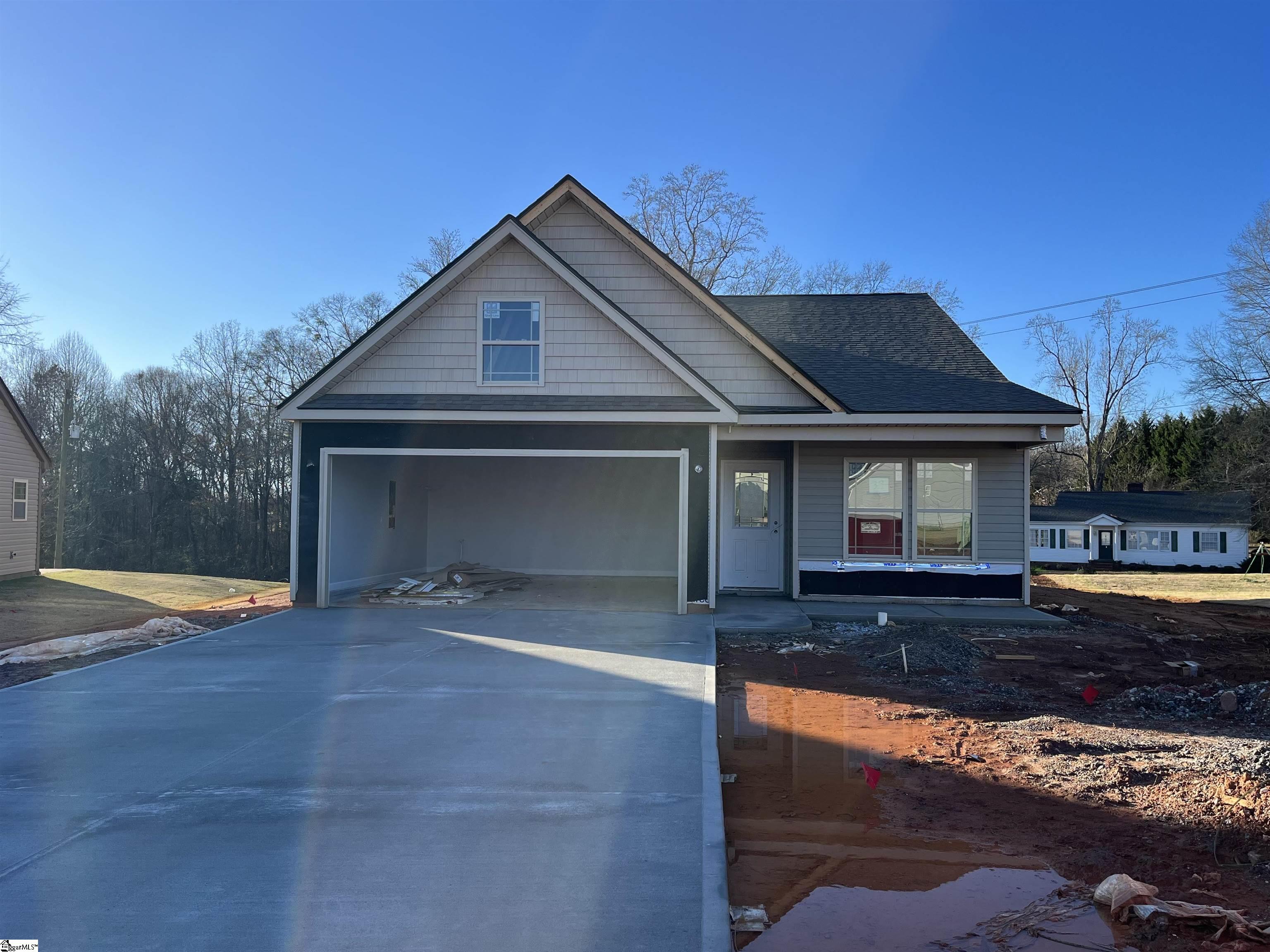 The Bishop plan is a single story plan featuring 3 bedrooms and 2 bathrooms plus an office/study. Standard features include trey ceiling with rope lighting in the living area and master bedroom, a fireplace, granite countertops throughout, and a back patio. Located in the NEW Elliott Park in Lyman just minutes from Spartanburg and Greenville. Call today for more info!