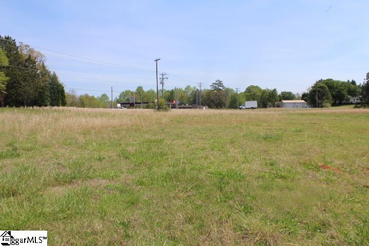 Large, Level, Cleared, 1.83 Acre Corner Lot with residential or commercial development potential.  Located on the corner of Highway 86/Bessie Road and Old Pelzer Road in Piedmont.  Sewer and public water are available.  Un-zoned area of Greenville County.