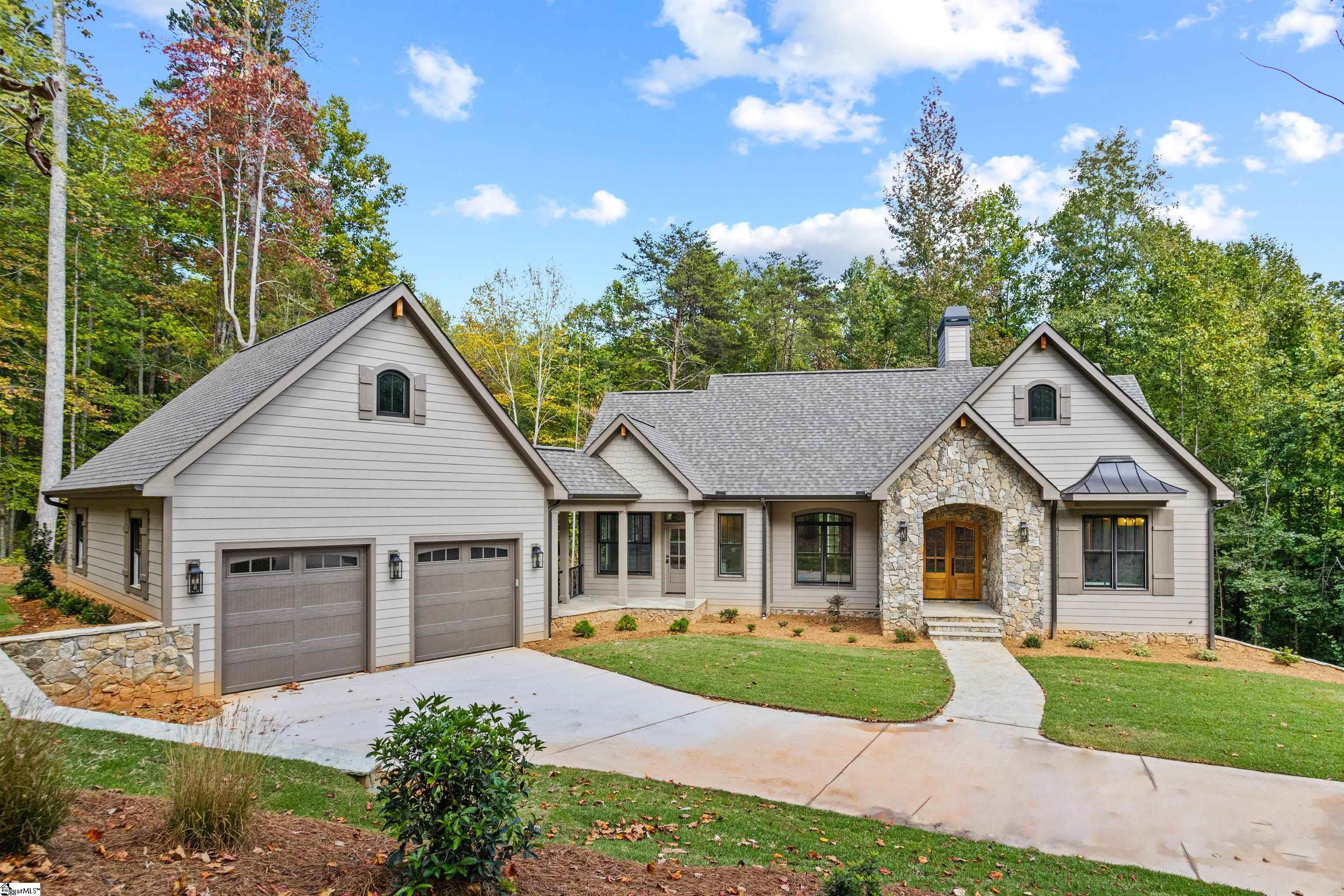 Enjoy true Luxury Living at the Cliffs at Mountain Park in this Beautiful, Brand New Donald Gardner designed home! Great location only 15 minutes to Travelers Rest & 20 minutes to Hendersonville, NC. Property is located just off the main road on a nice private cul-de-sac only minutes from the Clubhouse. There is a creek at the back of the property & on the other side of the creek is one of the many walking trails throughout Mountain Park. This home has been custom built by Bartron Builders and is ready for you to move in! Home features an LG gas cook top stove with double ovens as well as a backup Generator. A Cliffs Membership is available for Purchase. Don't miss out on this beautiful new home and make it YOURS!