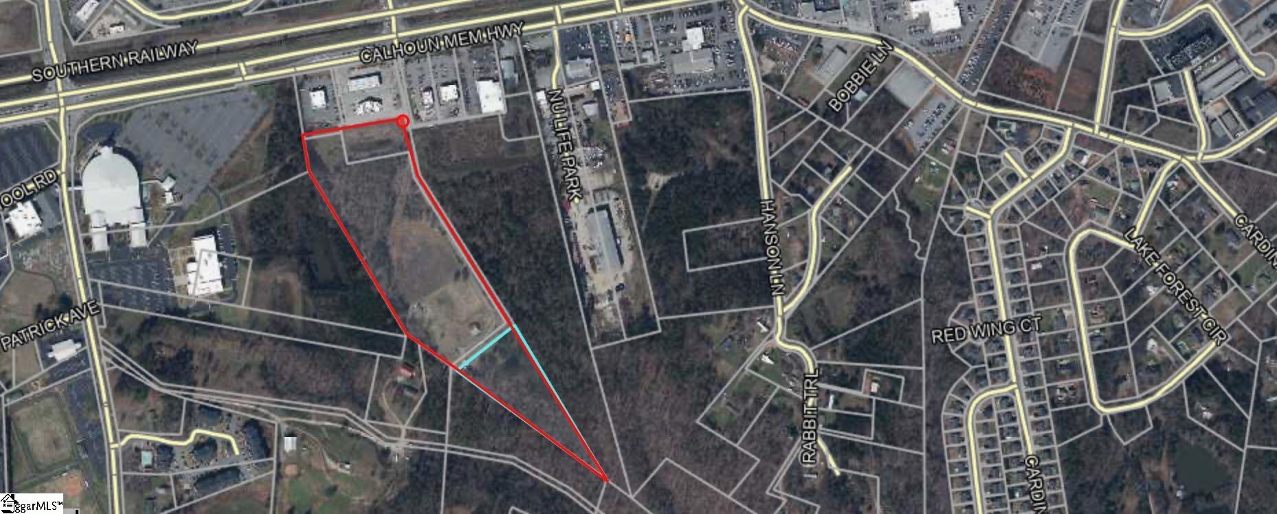 18.49 acres in the heart of the City of Easley but not in the city! Come see this acreage that is located at 123 across from Wal Mart. The property is located at the dead end road that runs between the Quik Trip and Freddy's. With a traffic count of over 38,000 vehicles and an average income in Easley of almost $60,000 a year what a perfect place for development! Sewer, water, and gas on site. There are several structures on the property currently a home at 2290 square feet of heated/ cooled area and over 5000 square feet total counting the basement. There is an electronic gate at the entrance to the property with fencing around part of the property.