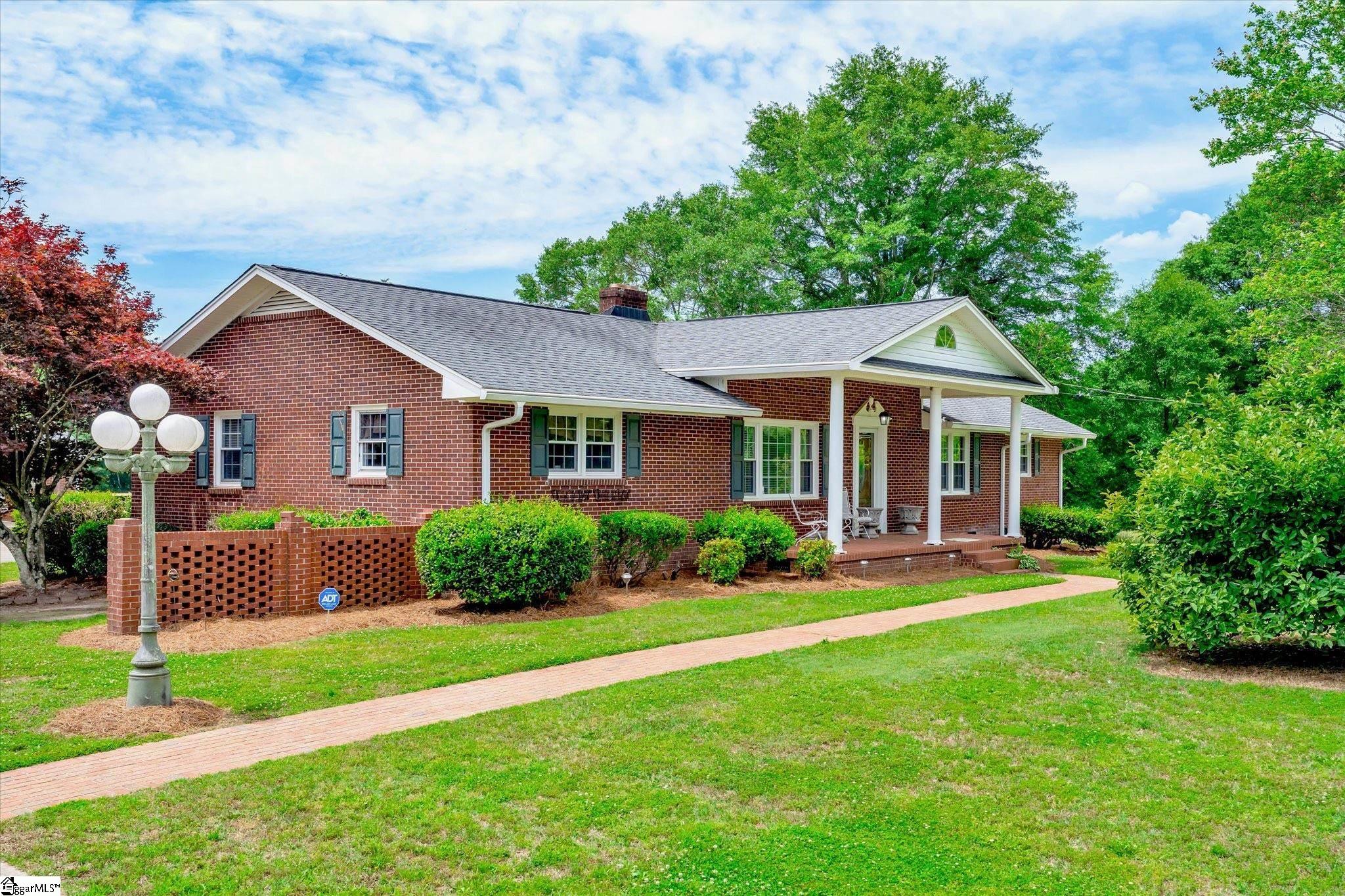 403 Joe Black Road! Own a 3 bedroom 3 bath home with 10 acre and additional acreage available! This 3 bedroom home has gorgeous hardwood floors throughout the main area! The kitchen has been renovated and features a built in refrigerator and oven! The countertops are solid surface, and there is a ceramic back splash around the counter! The living room has hardwood floors with gas logs! Two of the bedrooms feature full baths! Sit on the enclosed back porch and enjoy the serenity of nature! Grab a fishing rod and go down to the pond and catch fish! There is a very large detached garage with over 2900 square feet under roof! 10 acres perfect for horses, cows, or any other animals! There is a barn located on the property as well!