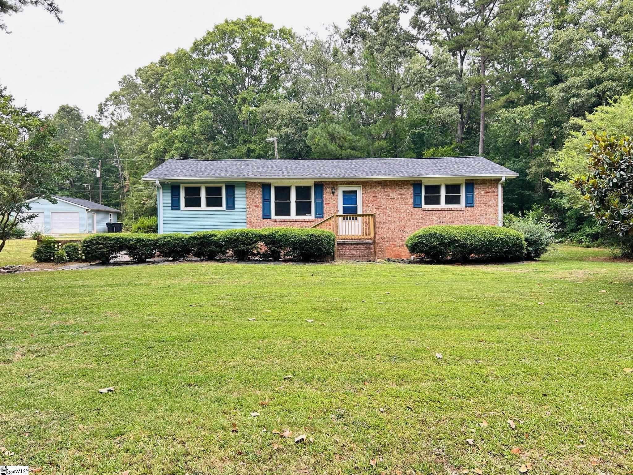 2020 Holiday Road Pelzer! You have to come see the freshly refinished hardwoods throughout the home! Where there is not hardwood there is newly installed LVP flooring. There is also fresh paint throughout the home. The home has a new architectural roof! This home is nestled on .90 acre lot! Concreted paved drive with plenty of room to park. There is also a 2 car detached garage (24x24) with electric! Come see this home before it is too late!