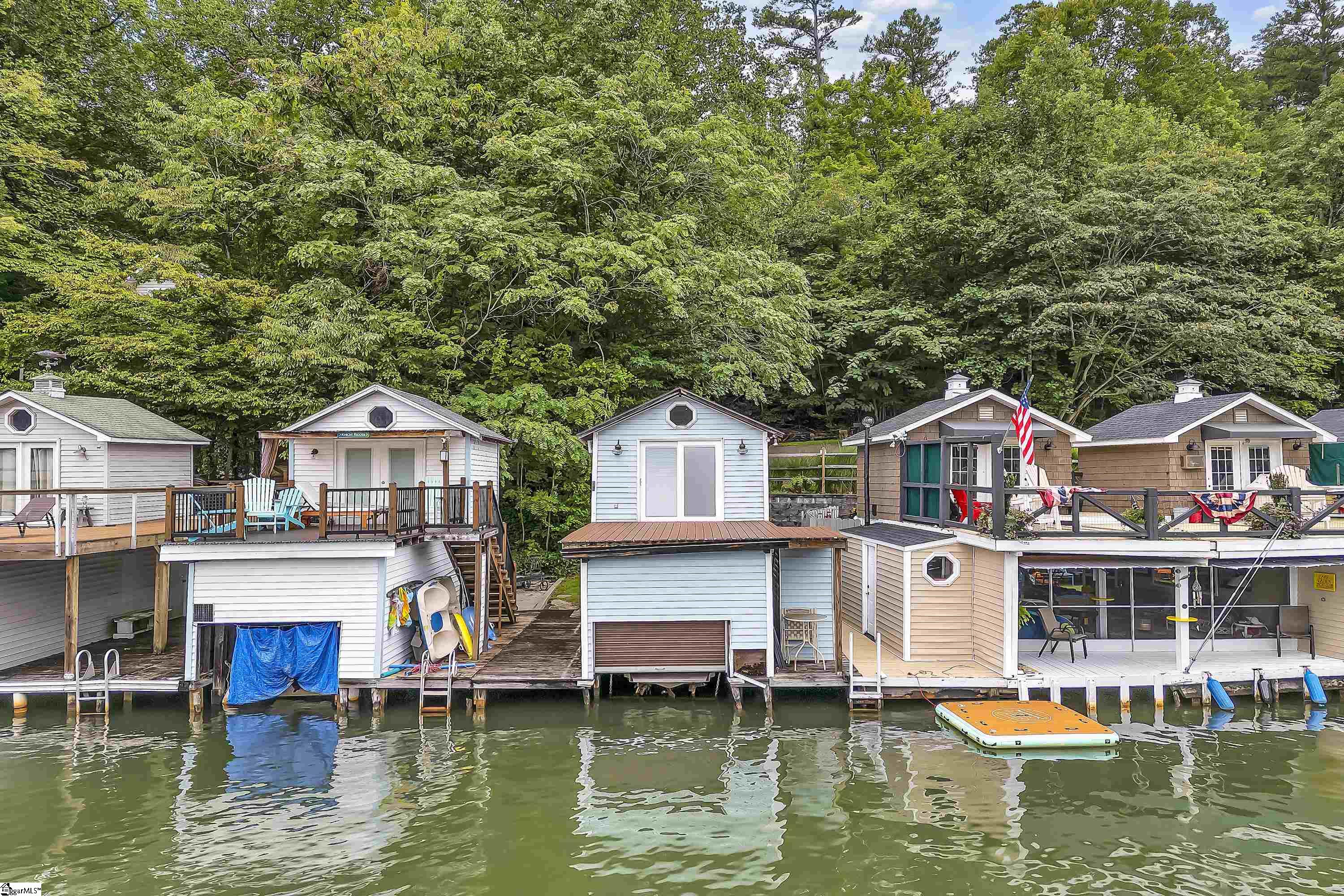 .40 of an acre with a boathouse and adjacent vacant lot
