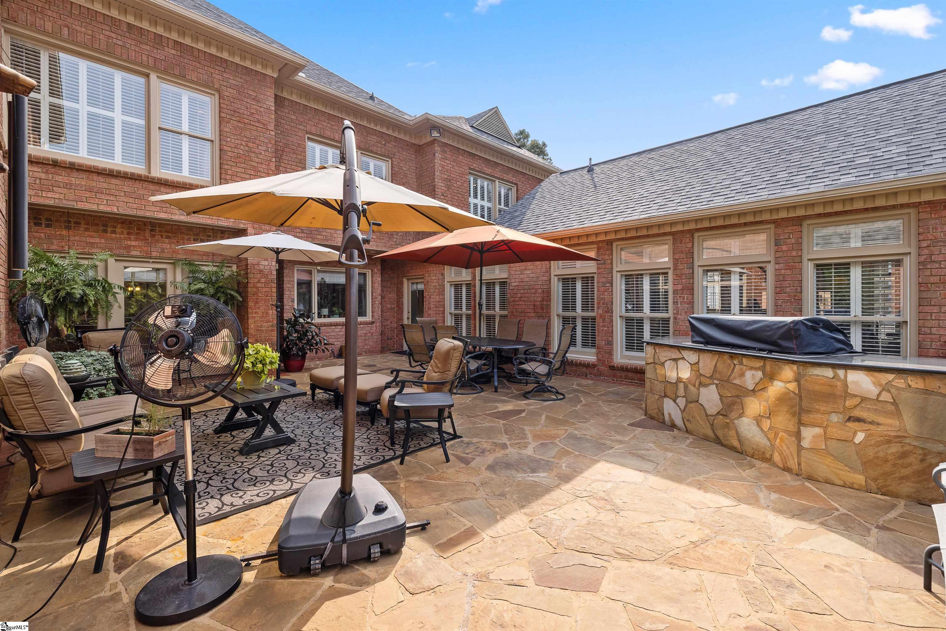 Fabulous large stone patio with built in grill area for entertaining!