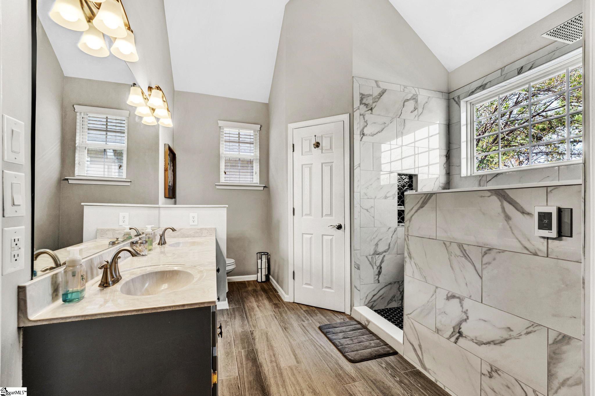 DOUBLE VANITIES, 2 WALK-INS, HEATED FLOOR!