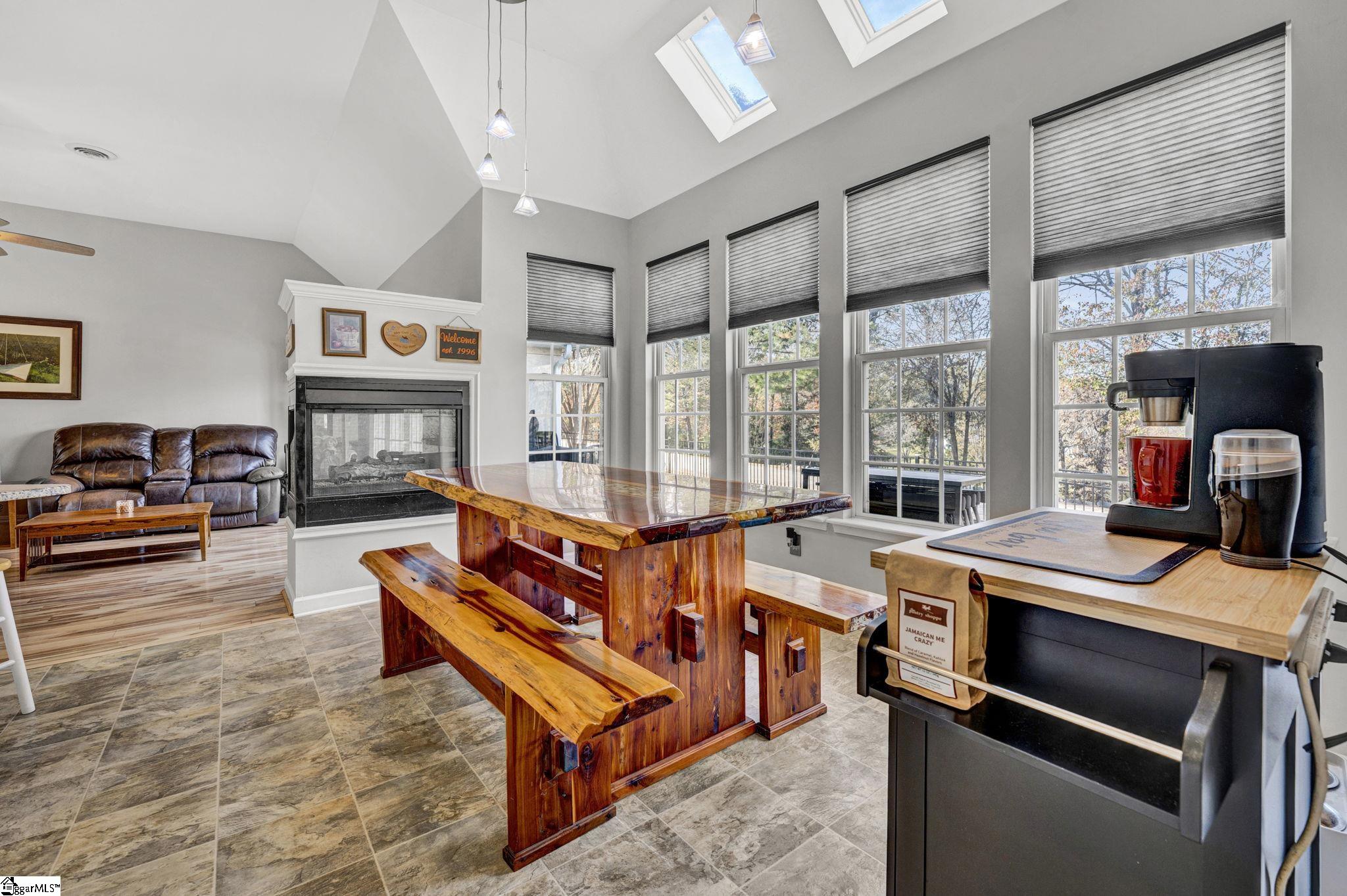 LIGHT, BRIGHT, SHARES 3-SIDED FIREPLACE.