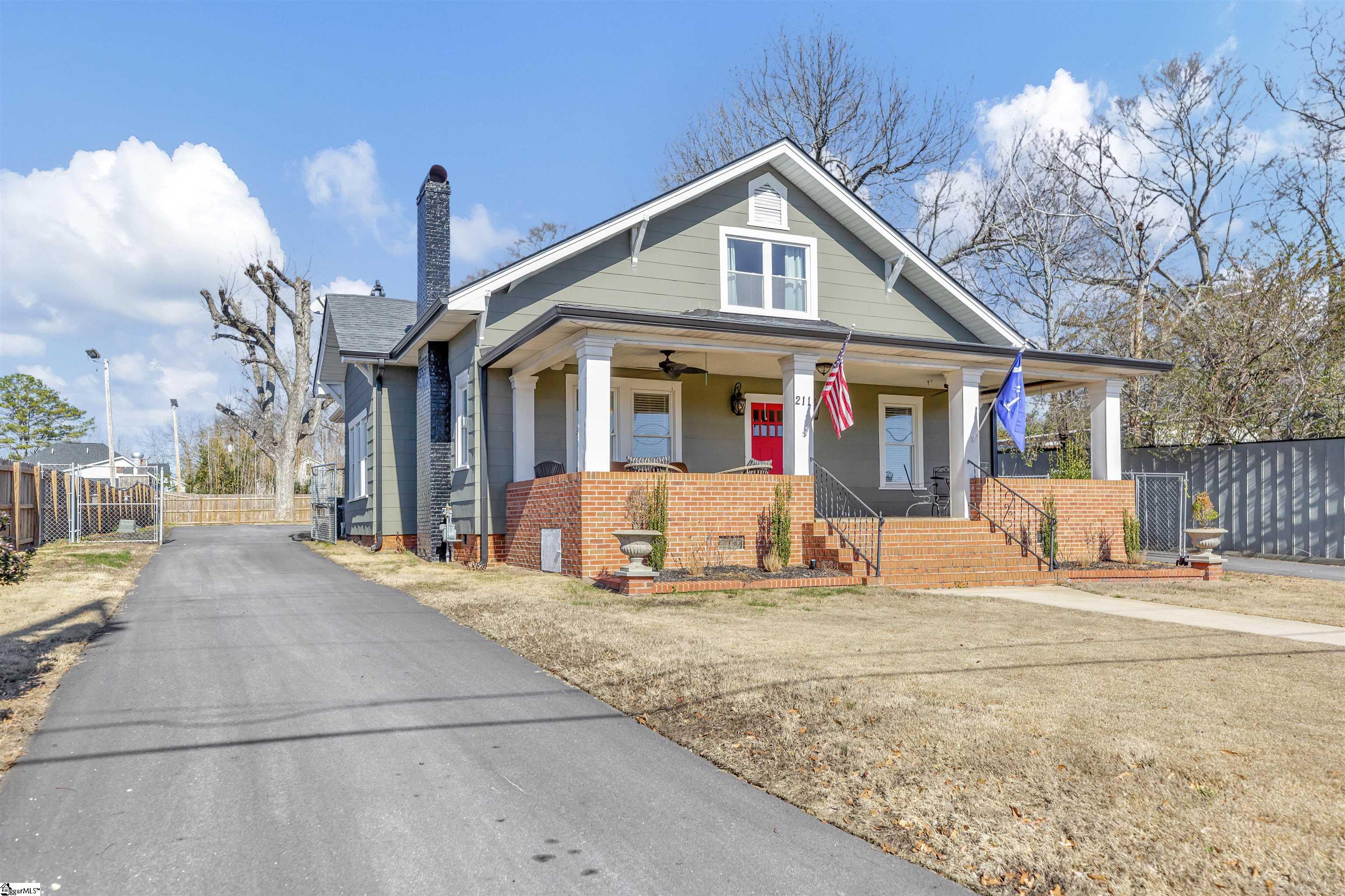 The driveway goes by the main house and ends at the guest home. The driveway is a circular drive.