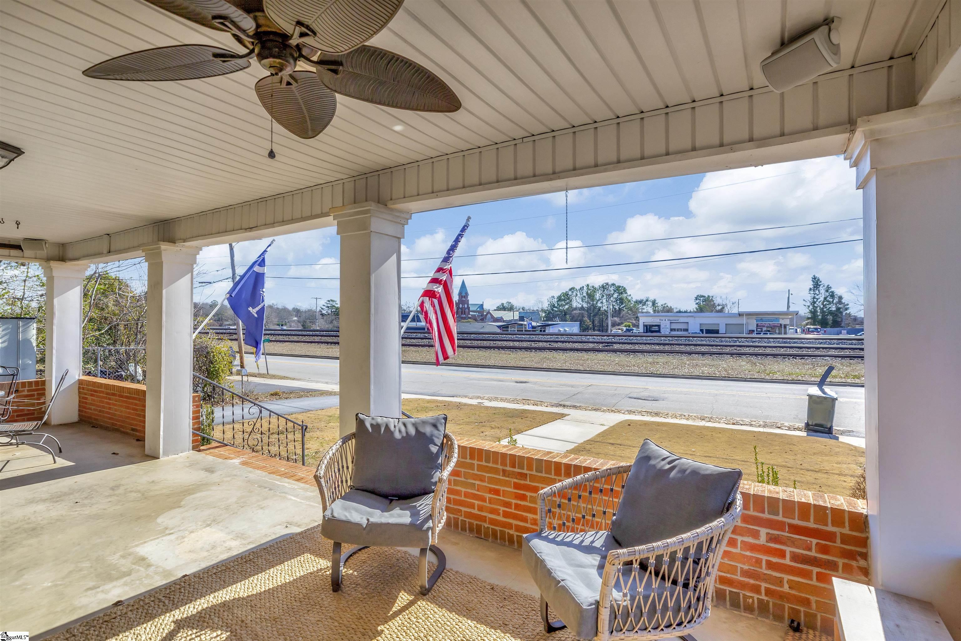 The main house covered porch. Great space to sit and relax!