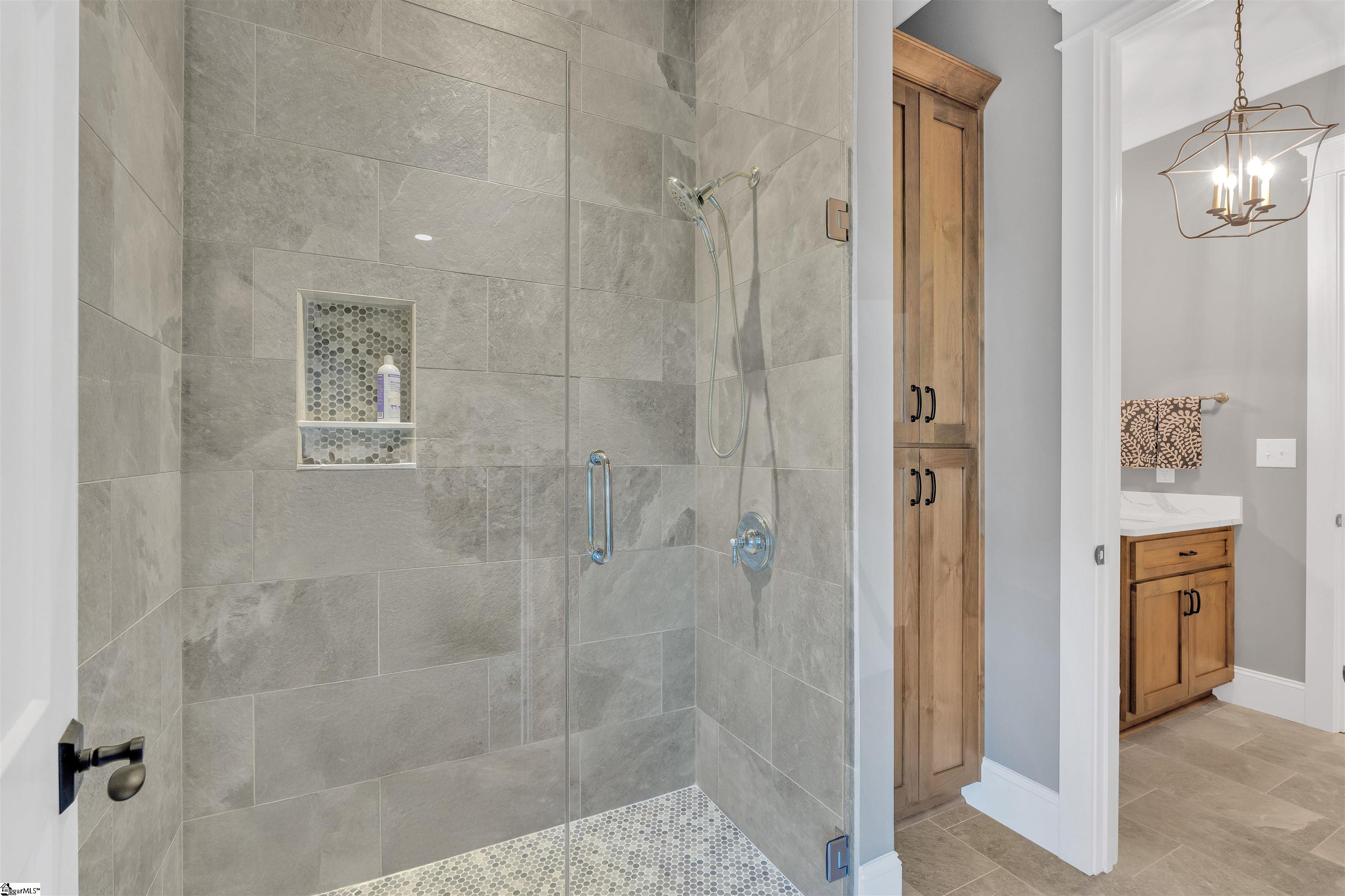Guest bathroom on main level off of the second bedroom with an entry from the hallway.