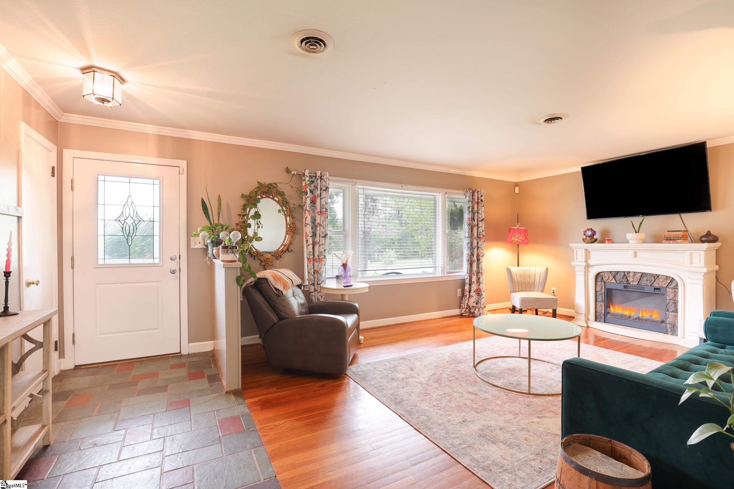 Main floor living room with beautiful hardwood floors.