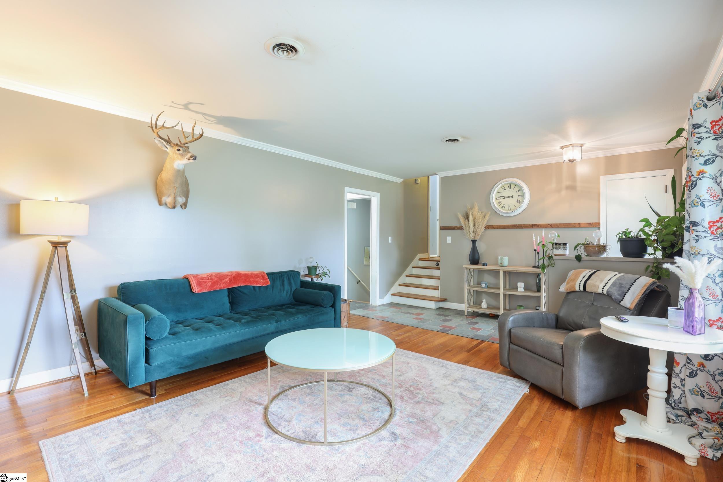 Main floor living room with beautiful hardwood floors.