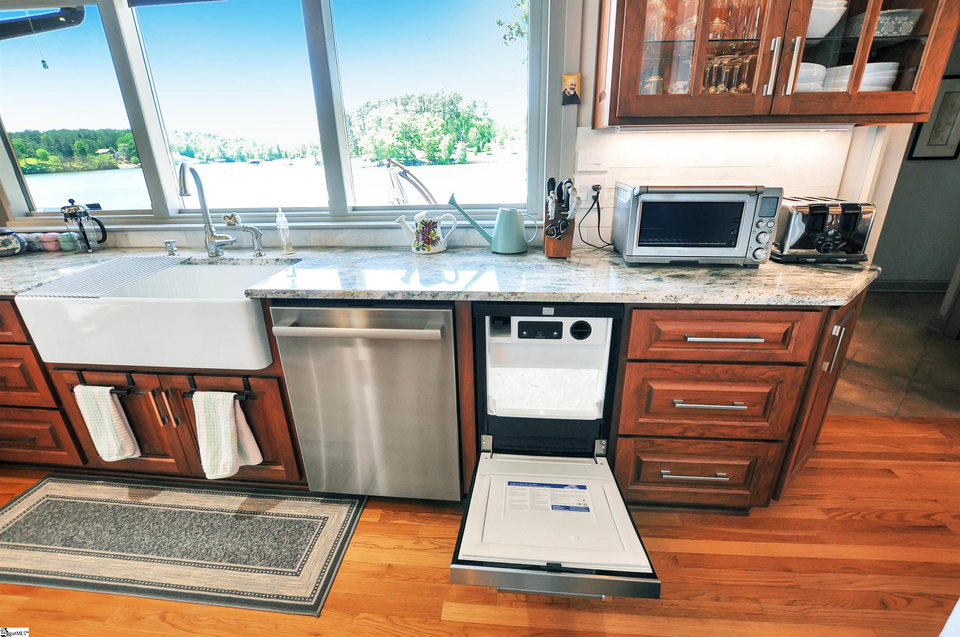 NEW CABINETS, FARM SINK, ICE MACHINE, SUPER QUIET BOSCH DW, GAS STOVE W/ HOOD.