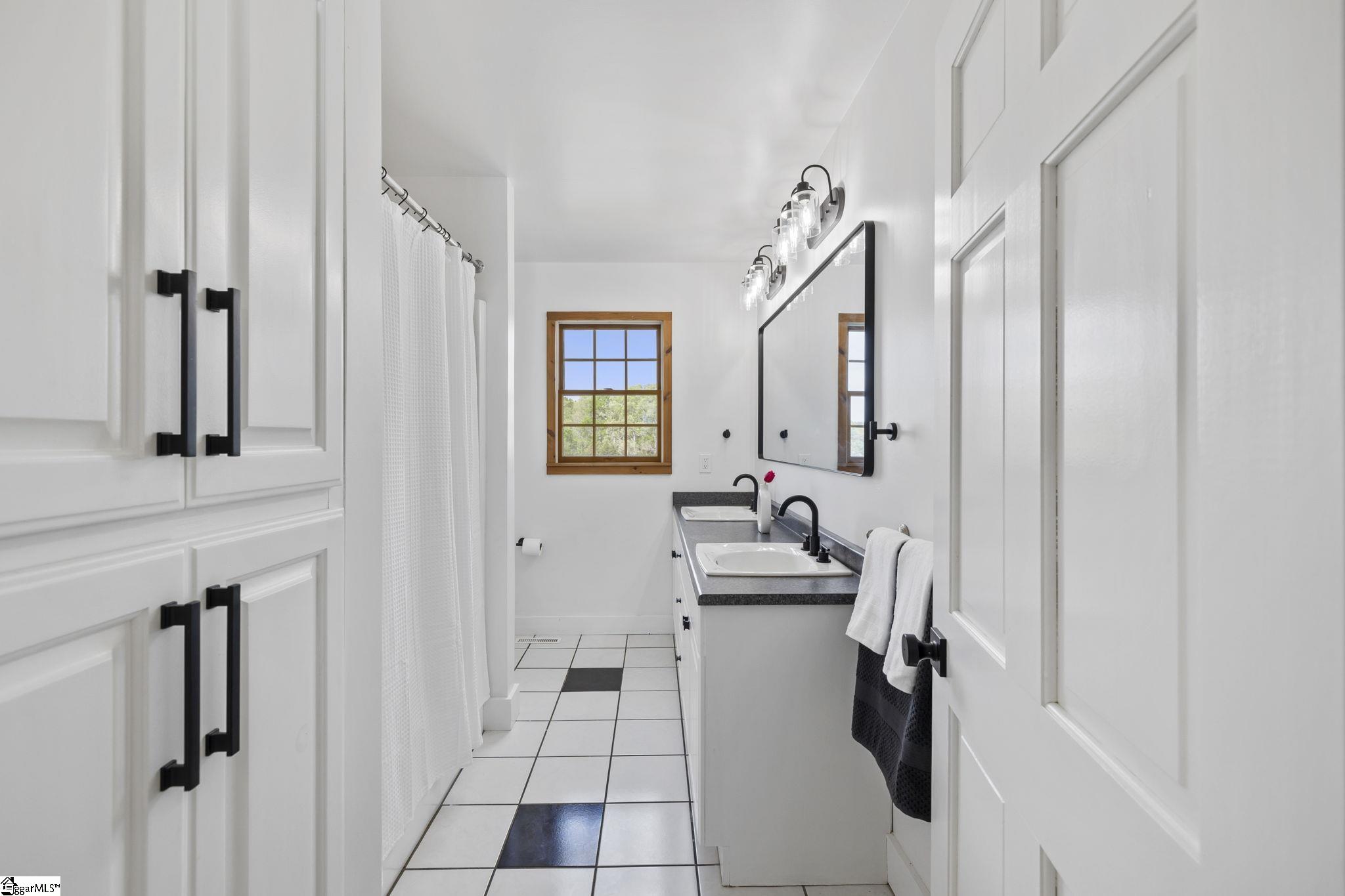 Full Bath #3 -Main Floor double vanity -Tub/Shower