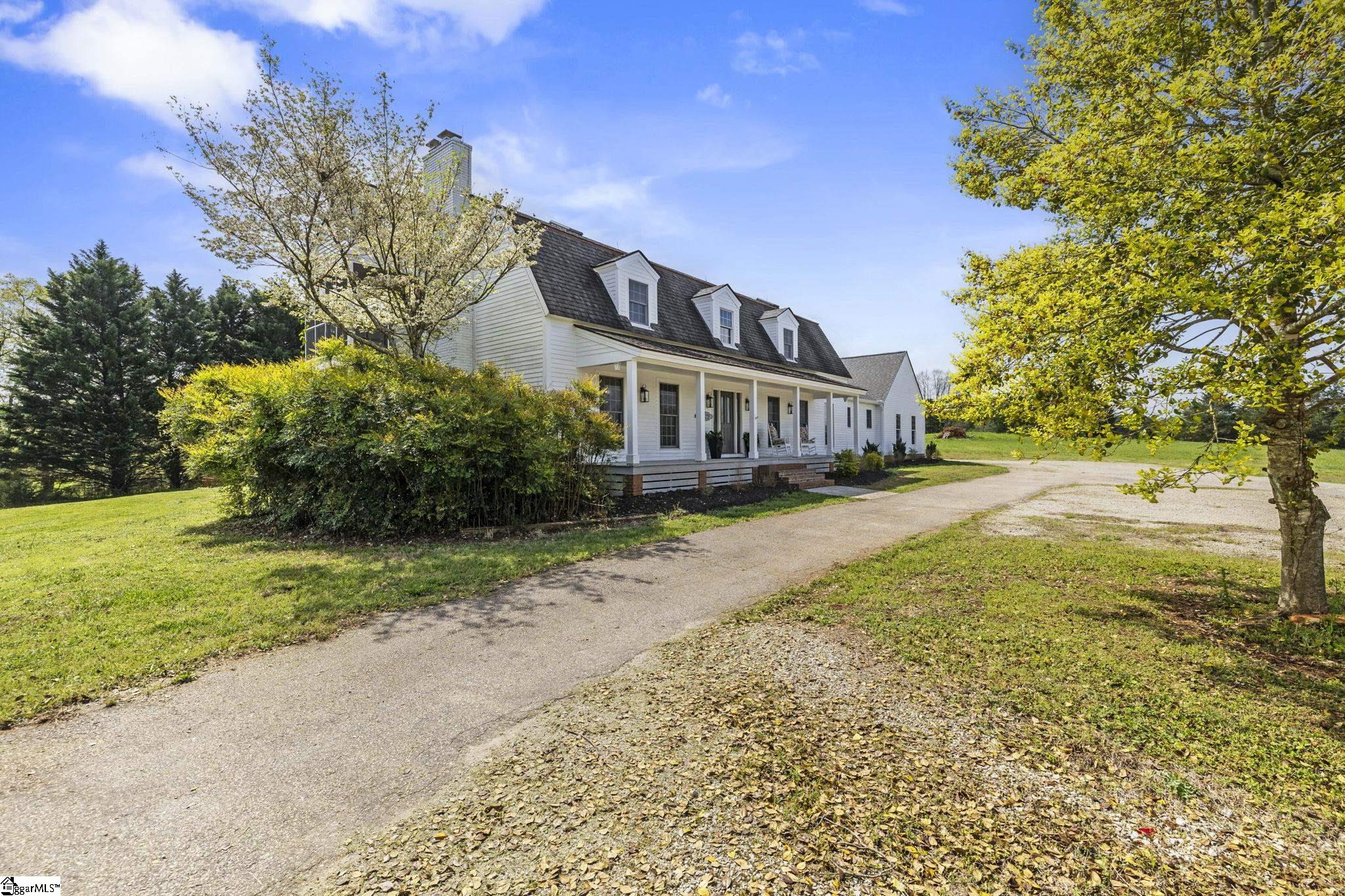 Left side of House & driveway