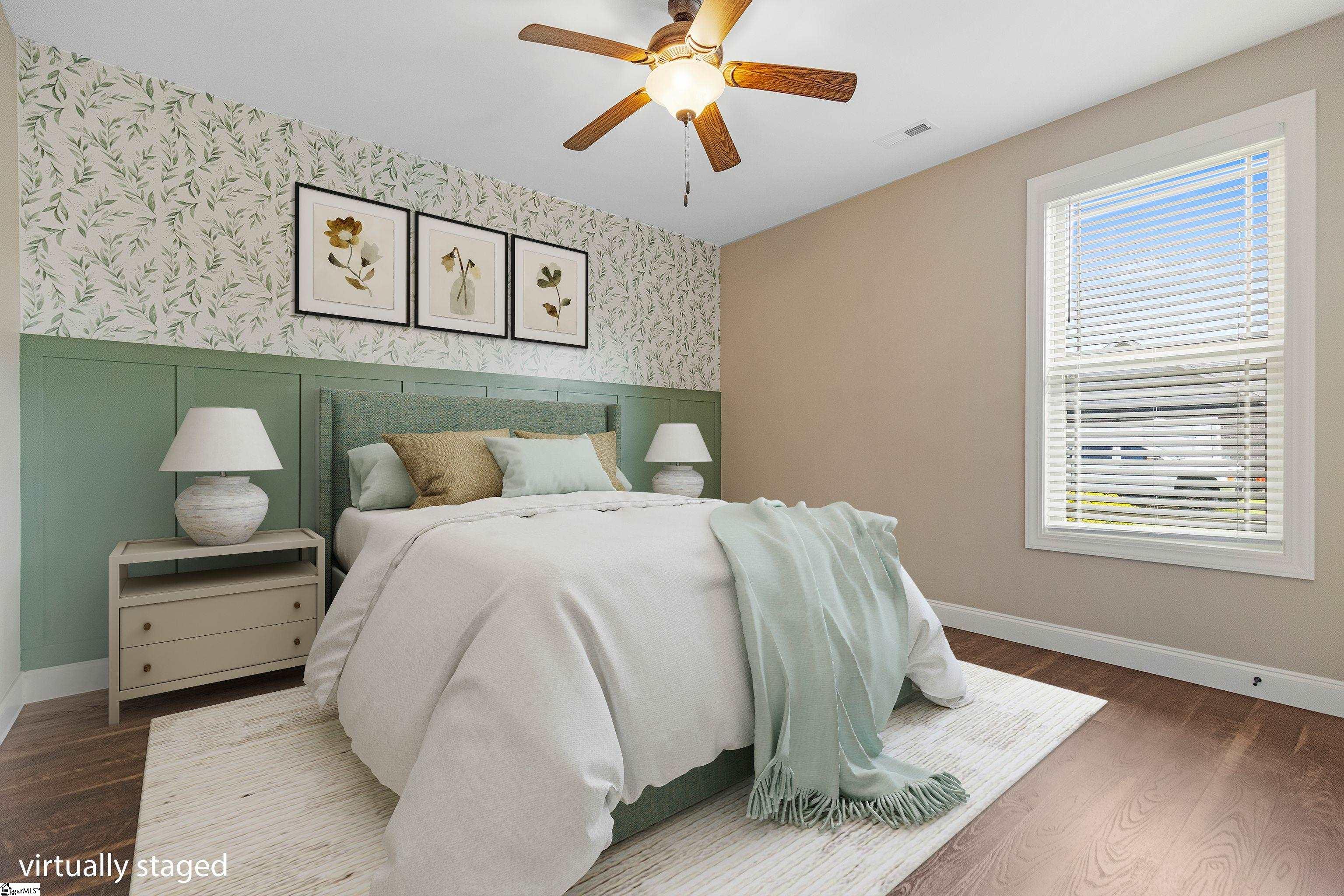 Second bedroom with generous closet space and soft natural light.
