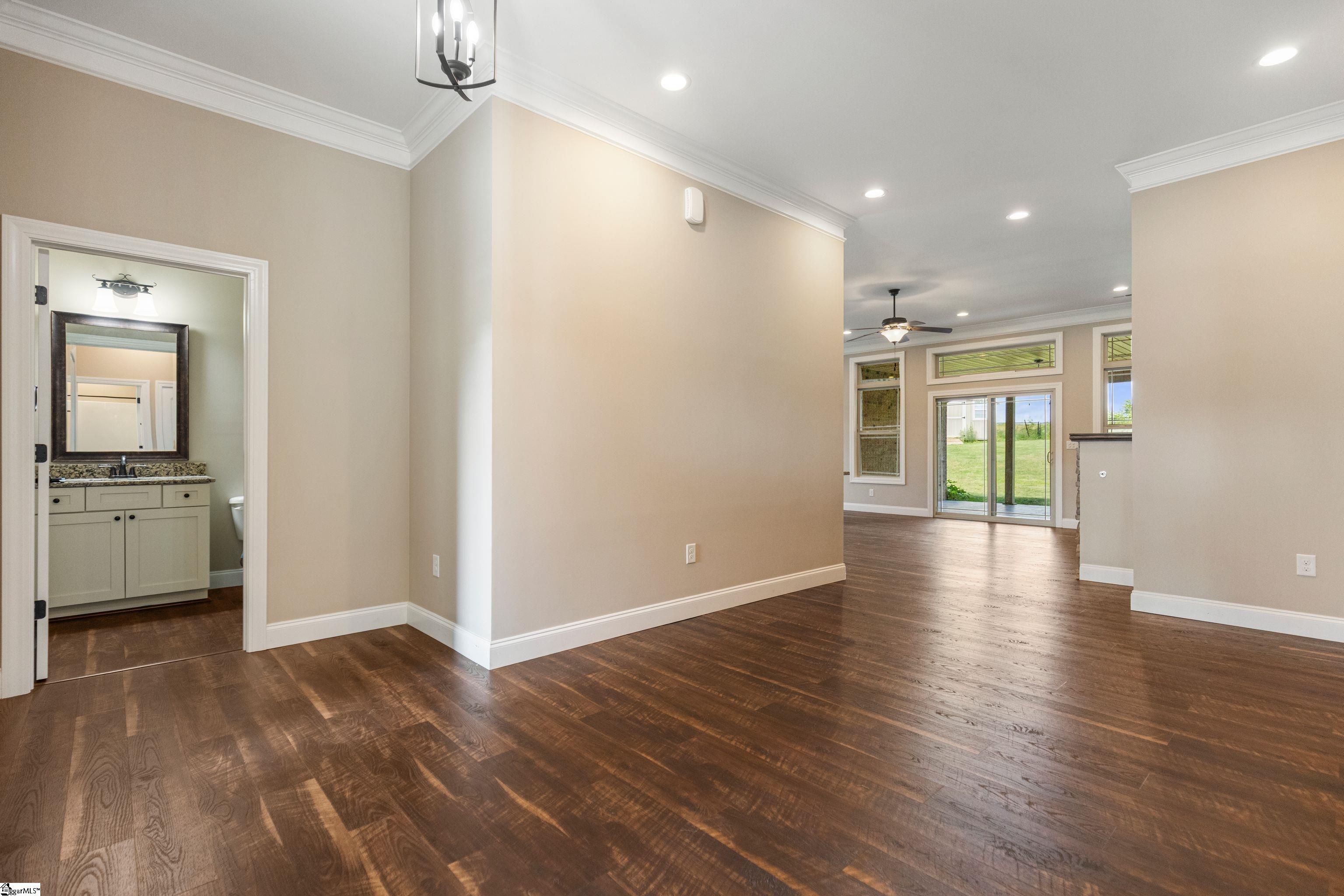 Large Welcoming Foyer with conveniently located Guest bath to the left