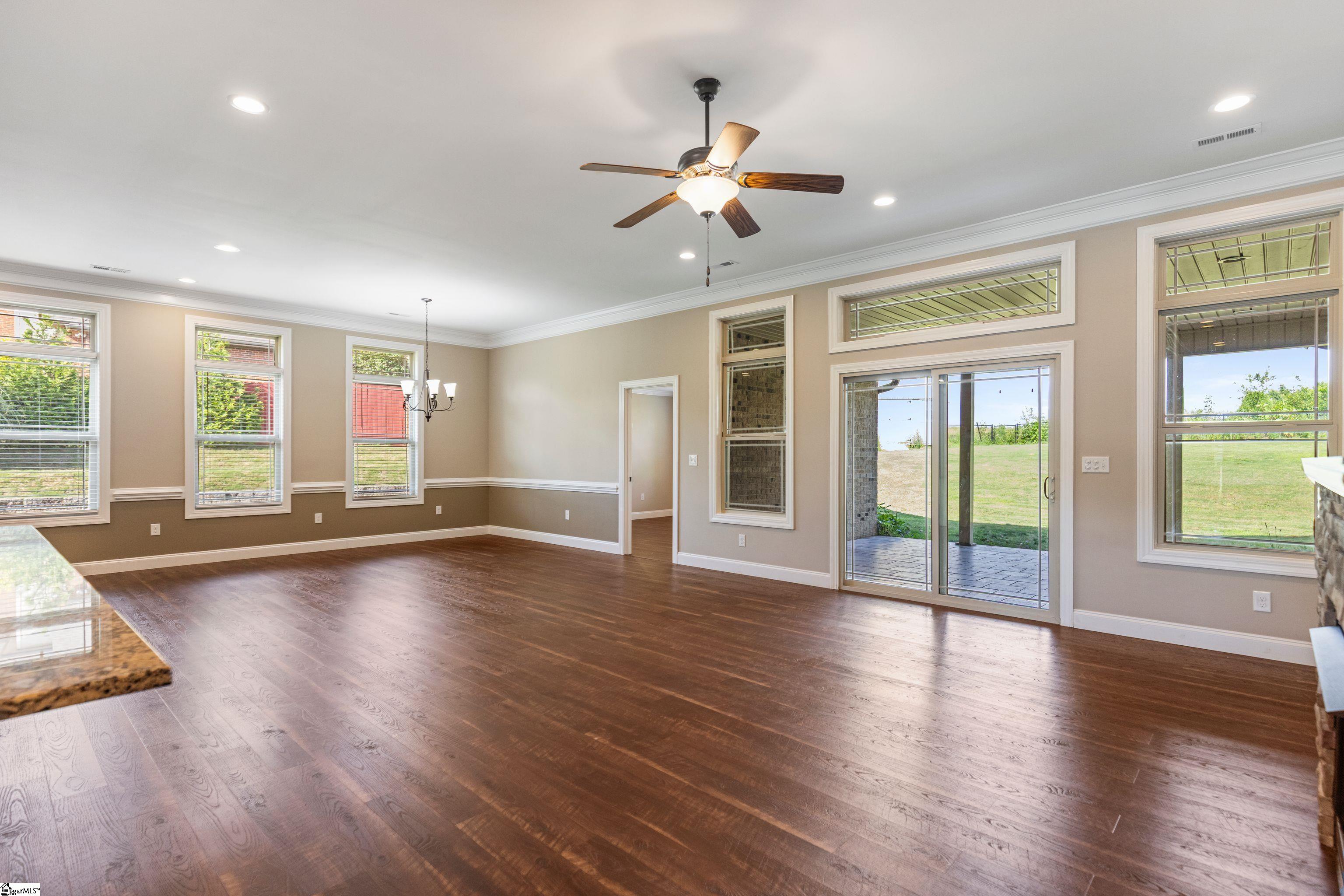 Sunny Great Room with easy access to the covered back patio great for relaxing and entertaining!