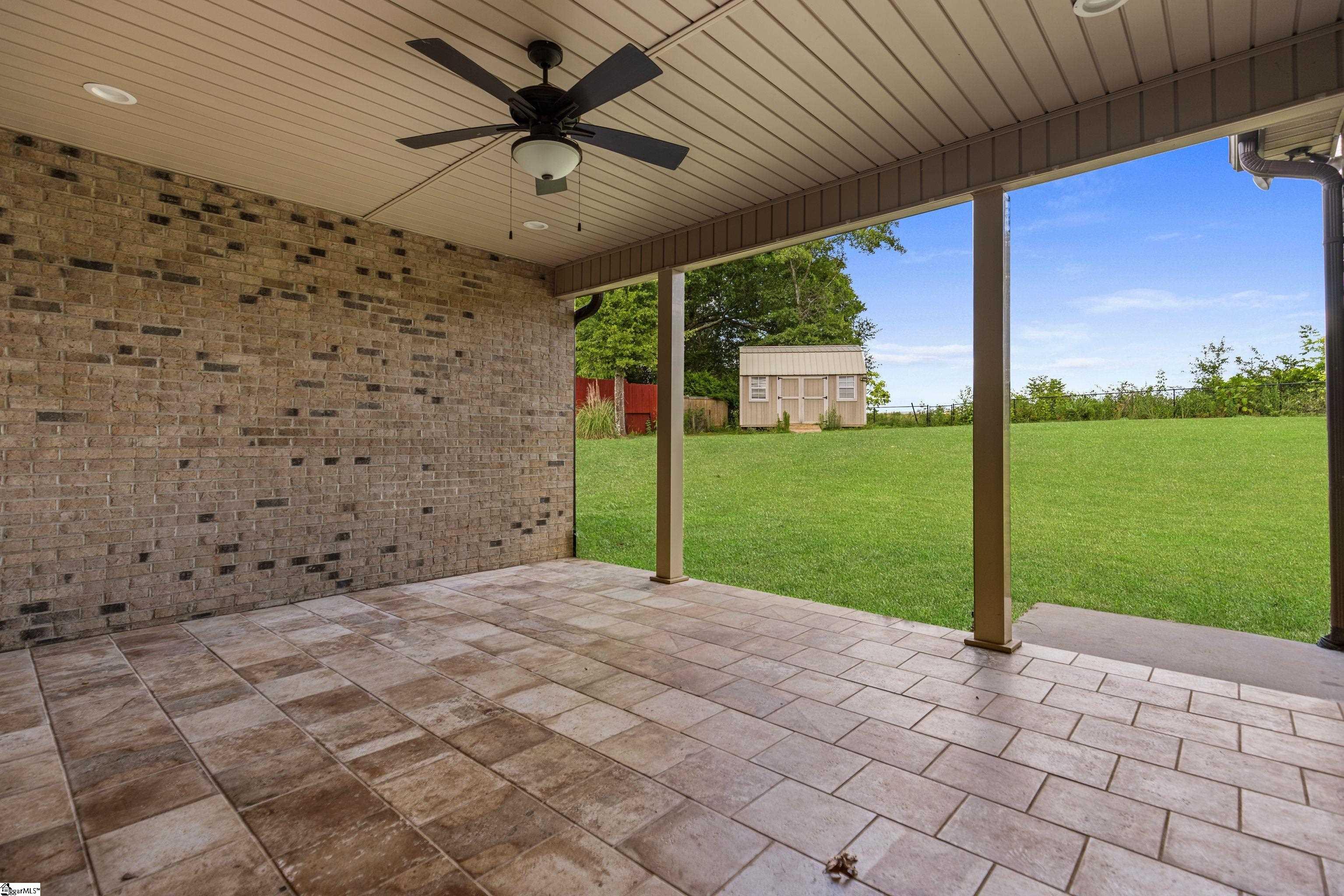 Relax on the covered back porch while enjoying sunset views—ideal for evening unwinding!
