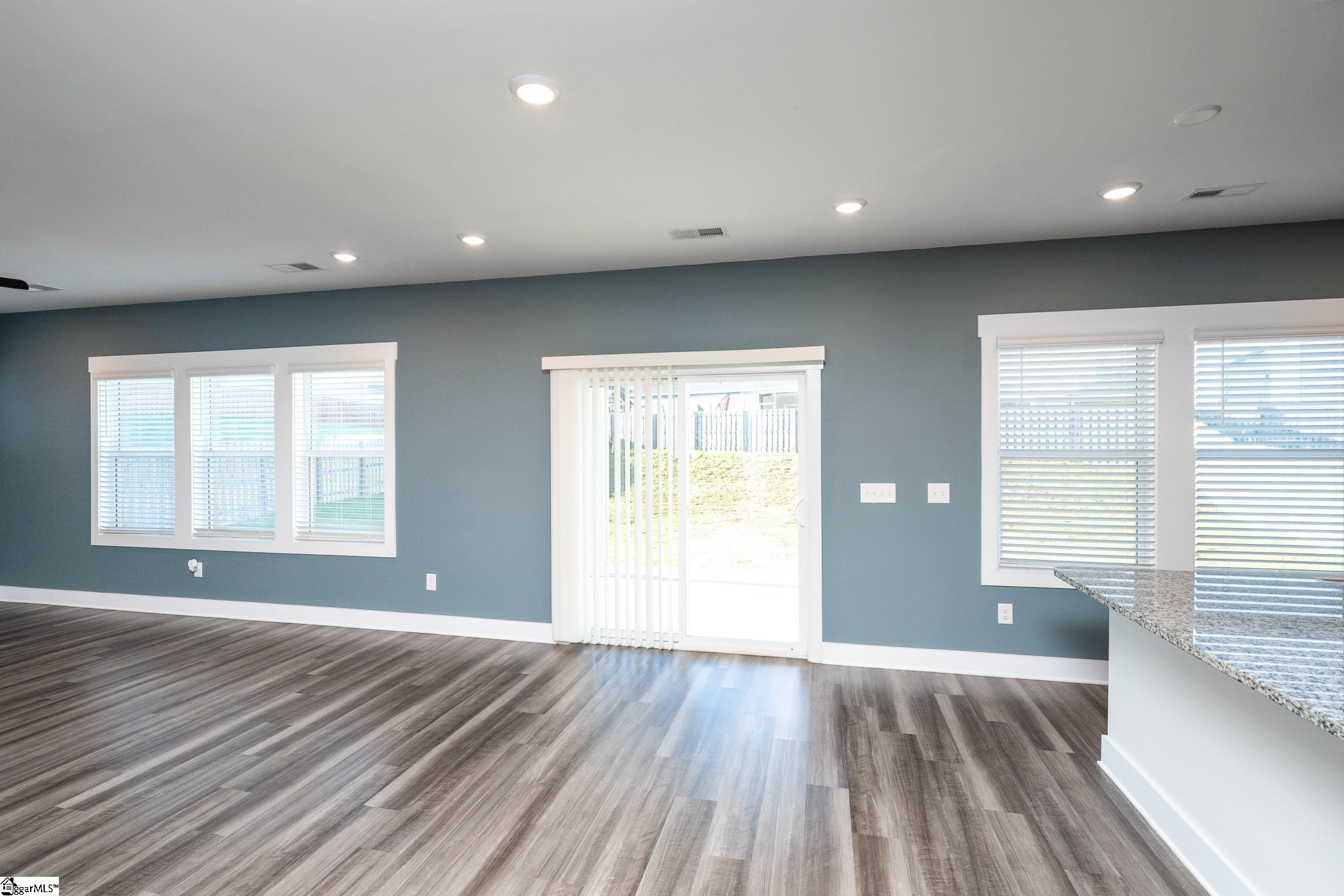 Open floor plan. Door leads out to back yard.