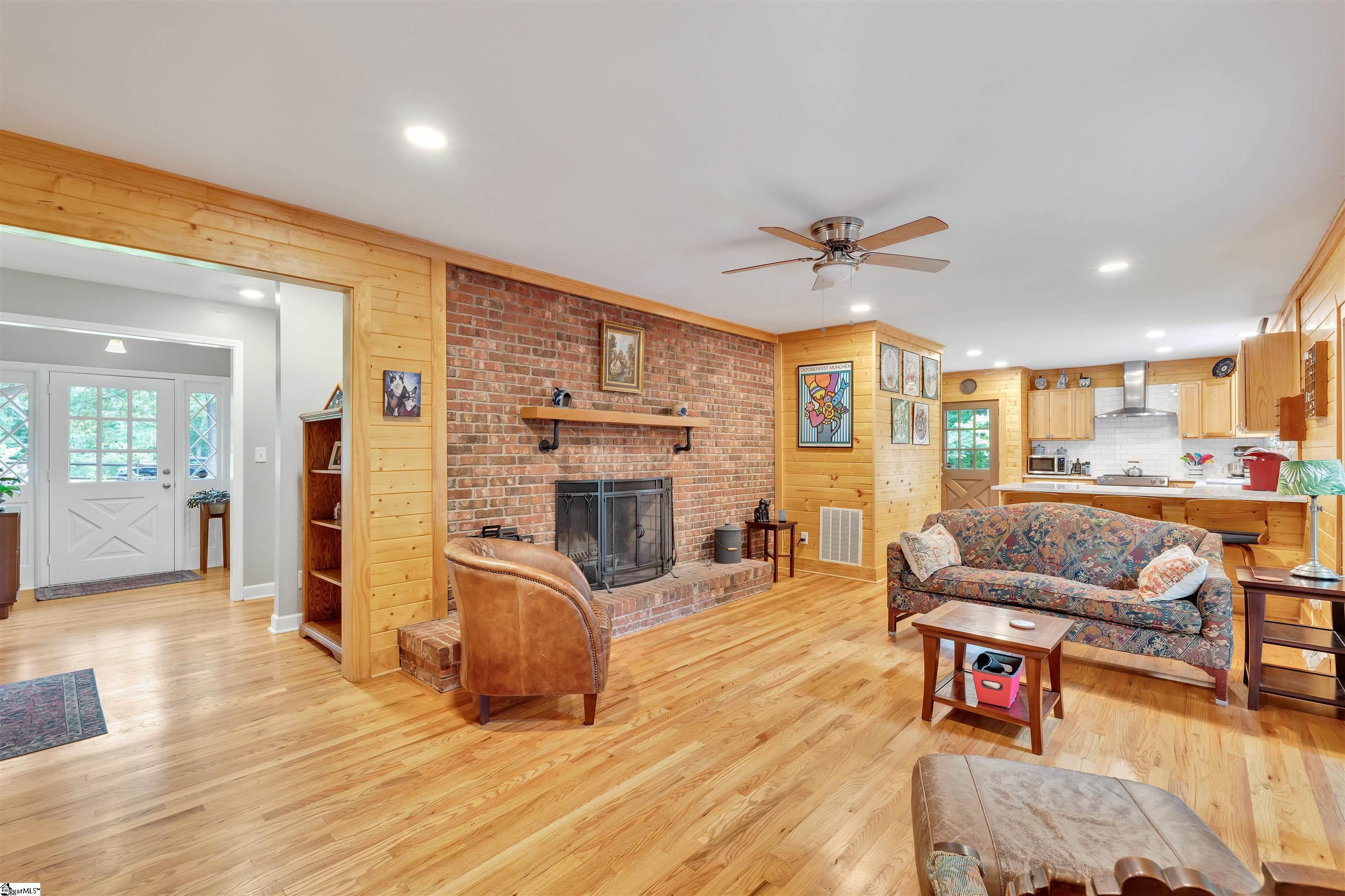 Hardwood Floors, Brick Fireplace, Wood Mantle