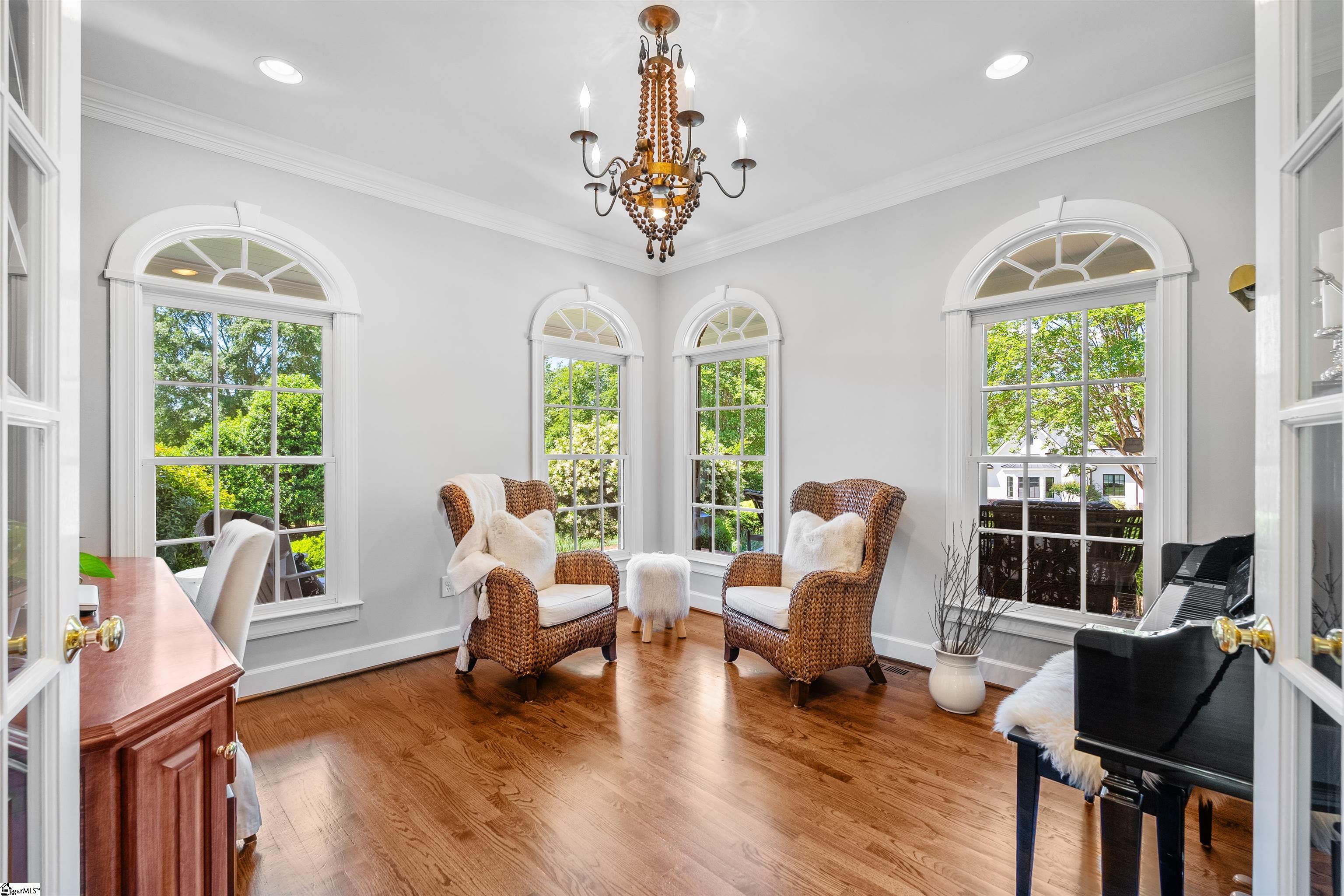 Features custom built in desk & shelving