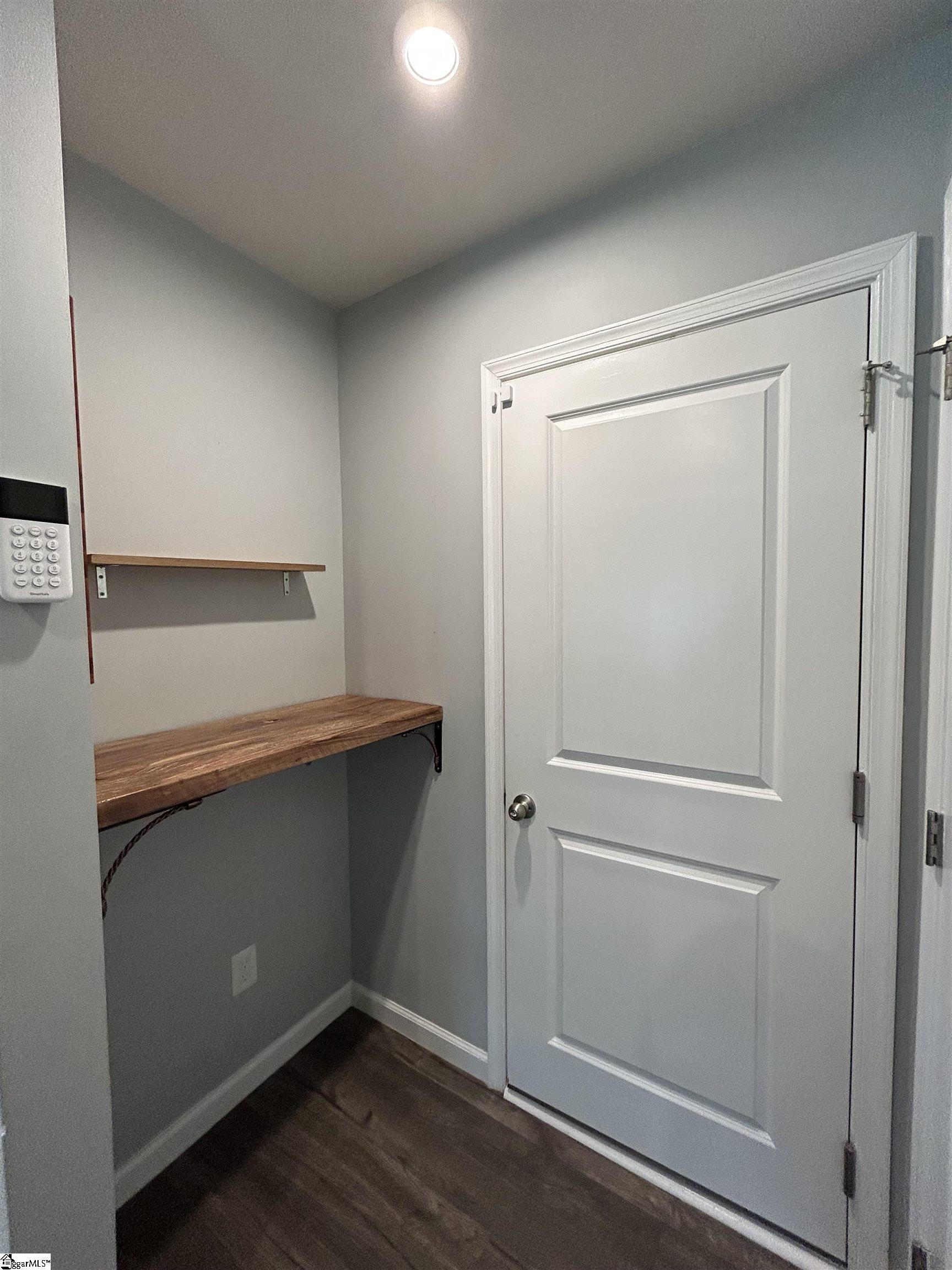 Office Area / Study Nook just off kitchen leading to 2 car garage.