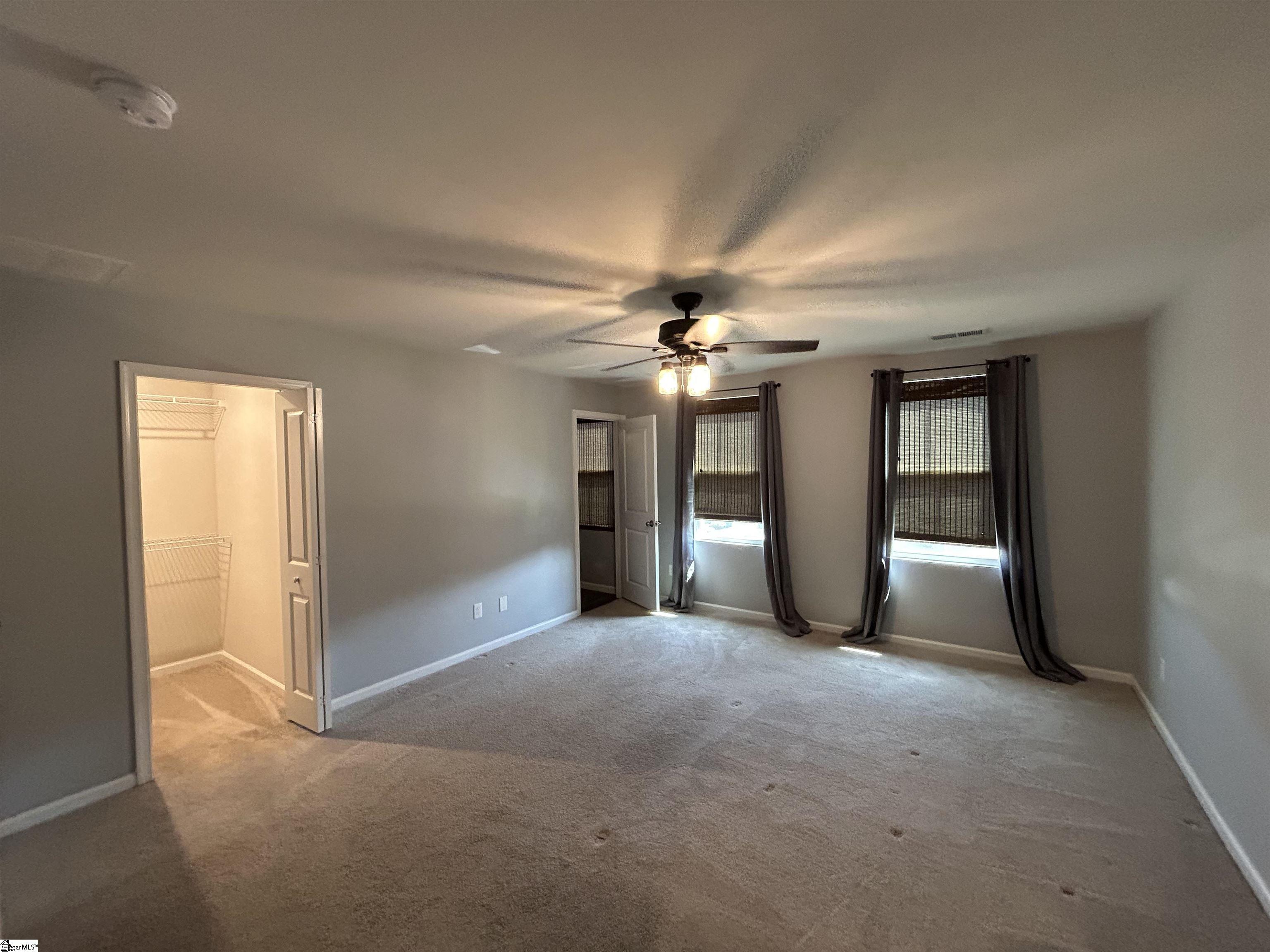 Primary Bedroom located on 2nd Floor with Private Bath, and two walk-in closets.
