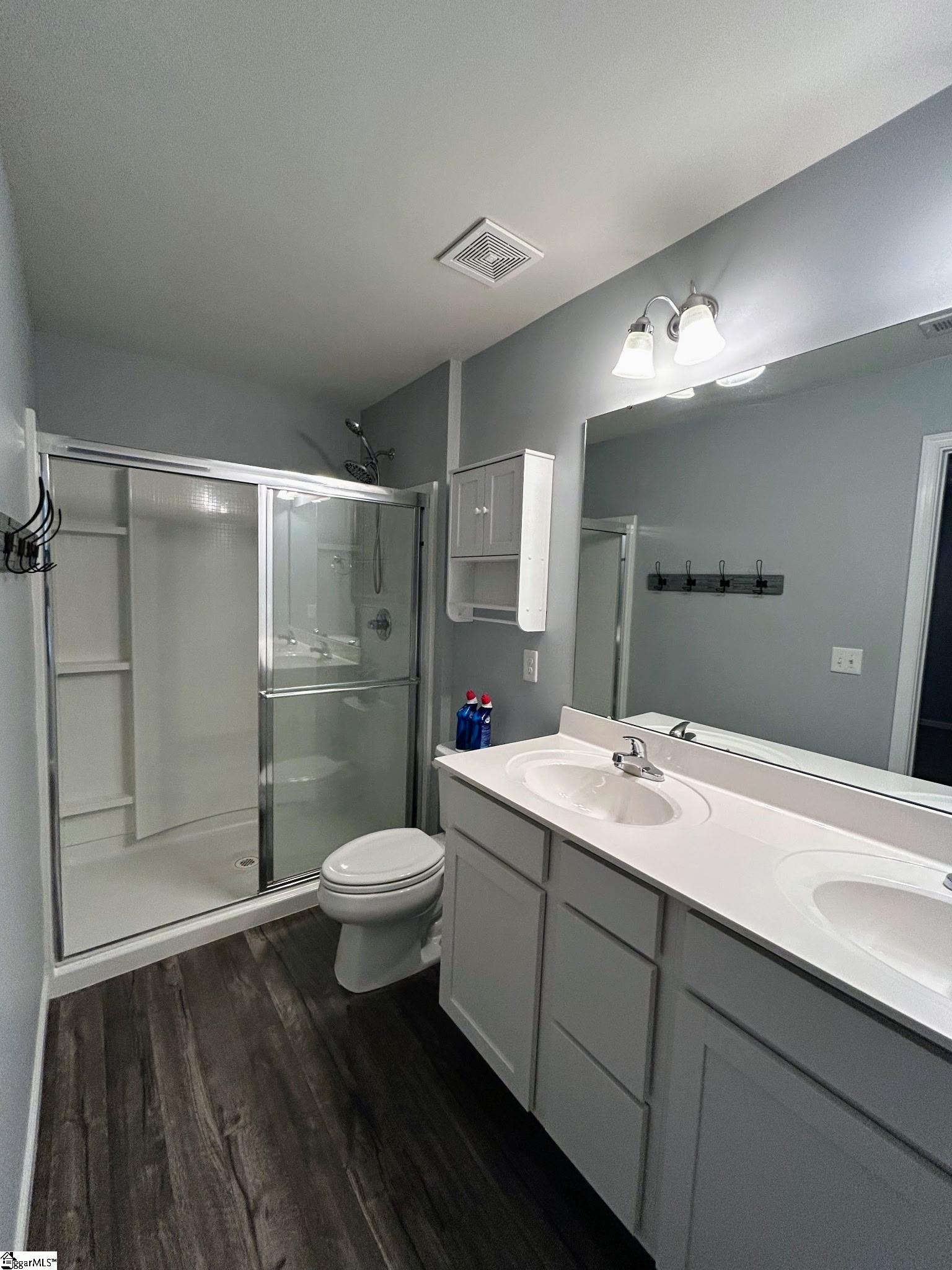 Primary Bedroom with shower only, double sink vanity