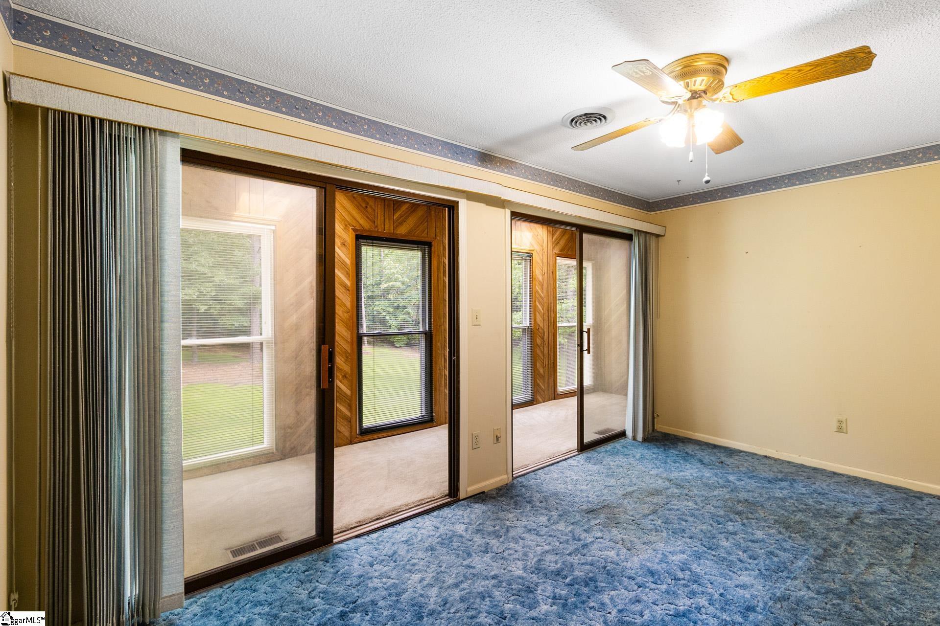 view of sunroom off bedrroom