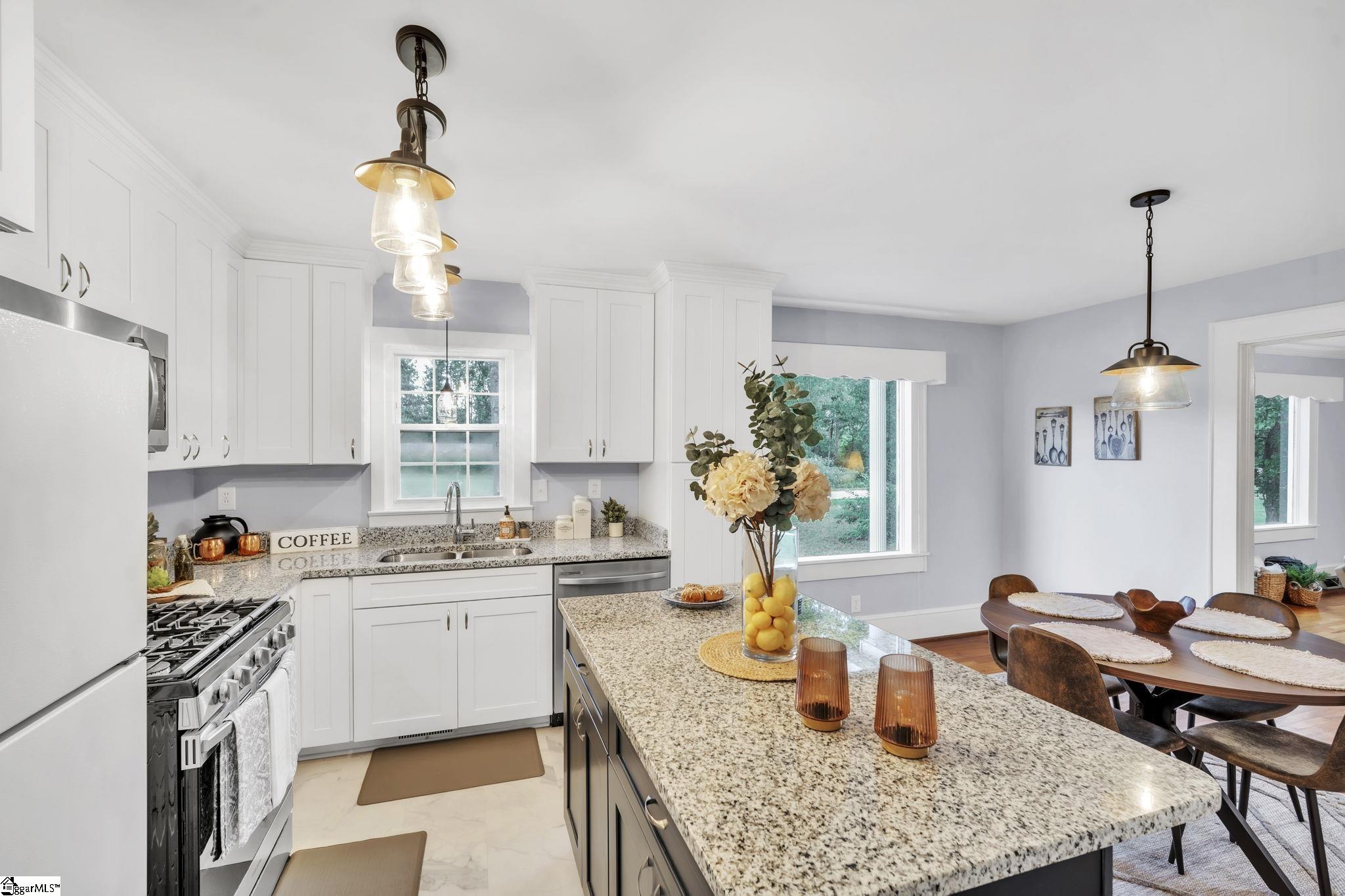 Remodeled Kitchen with Granite Counters, Gas Range + Island