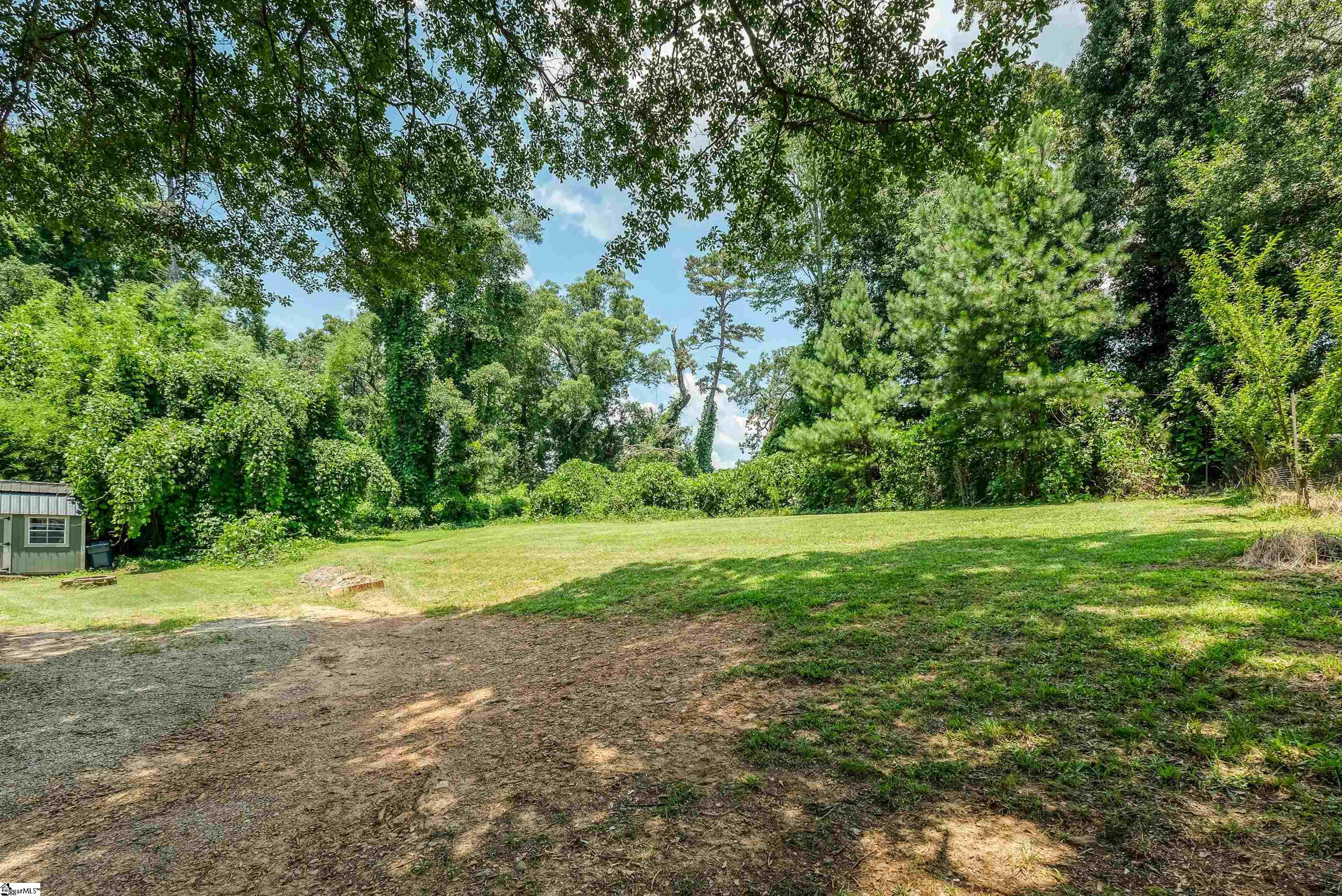 Large backyard with fenced in side yard.
