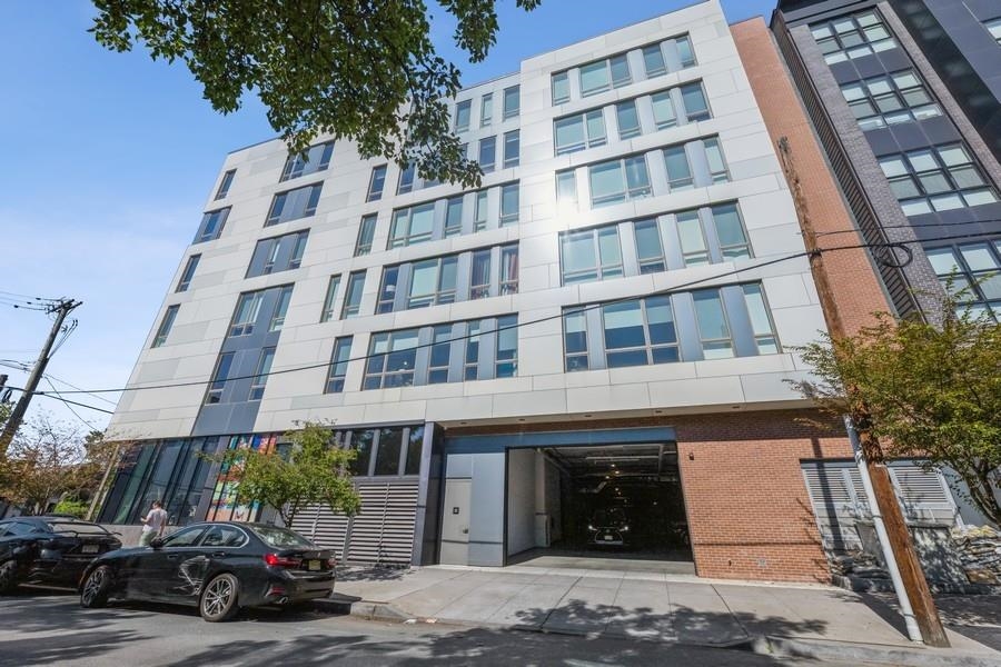 Welcome to the largest 2 bedroom unit at 380 Newark Ave! Over 1200 Square feet of sun drenched fabulousness in this south facing unit. No detail has been overlooked in curating this “brand new like”condo- with high floor to ceiling windows, dark rich hardwood floors throughout, a gorgeous modern kitchen with state of the art appliances, trendy en-suite and baths, washer and dryer in unit and spacious bedrooms with ample closet space. The luxury doesn’t stop there.. 380 Newark has an entertainer’s roof top deck with grill and great views, fitness center; children’s play area with stroller parking, a virtual doorman, and even bike storage on site! You’ll love the neighbor's conveniences like its nightlife, amazing JC downtown eateries, coffee shops, parks and close proximity to public transportation. This unit has a tax abatement until 2028. The best part is this lovely home is VACANT & MOVE-in-READY! While rents are soaring high and apartments unfruitful, this makes this the perfect opportunity to buy.   Book your showing today!