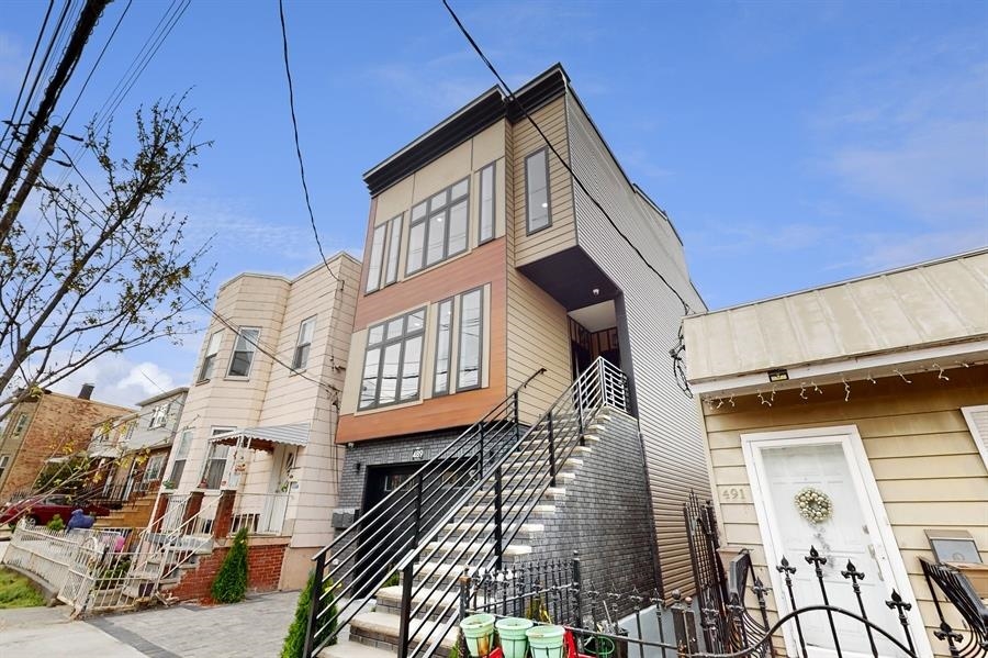 Luxury living awaits! Welcome to this expansive, gorgeously modern home located in one of Jersey City's hottest locations! This new construction roof top duplex boasts many sophisticated features including red oak hardwood flooring, quartz countertops, private balconies and more! Property comes with a 10 yr. new home owner warranty and 5 yr. tax abatement. Property taxes to be independently verified by the Jersey City Tax Office. Don't wait! At this great price, this property won't last long.