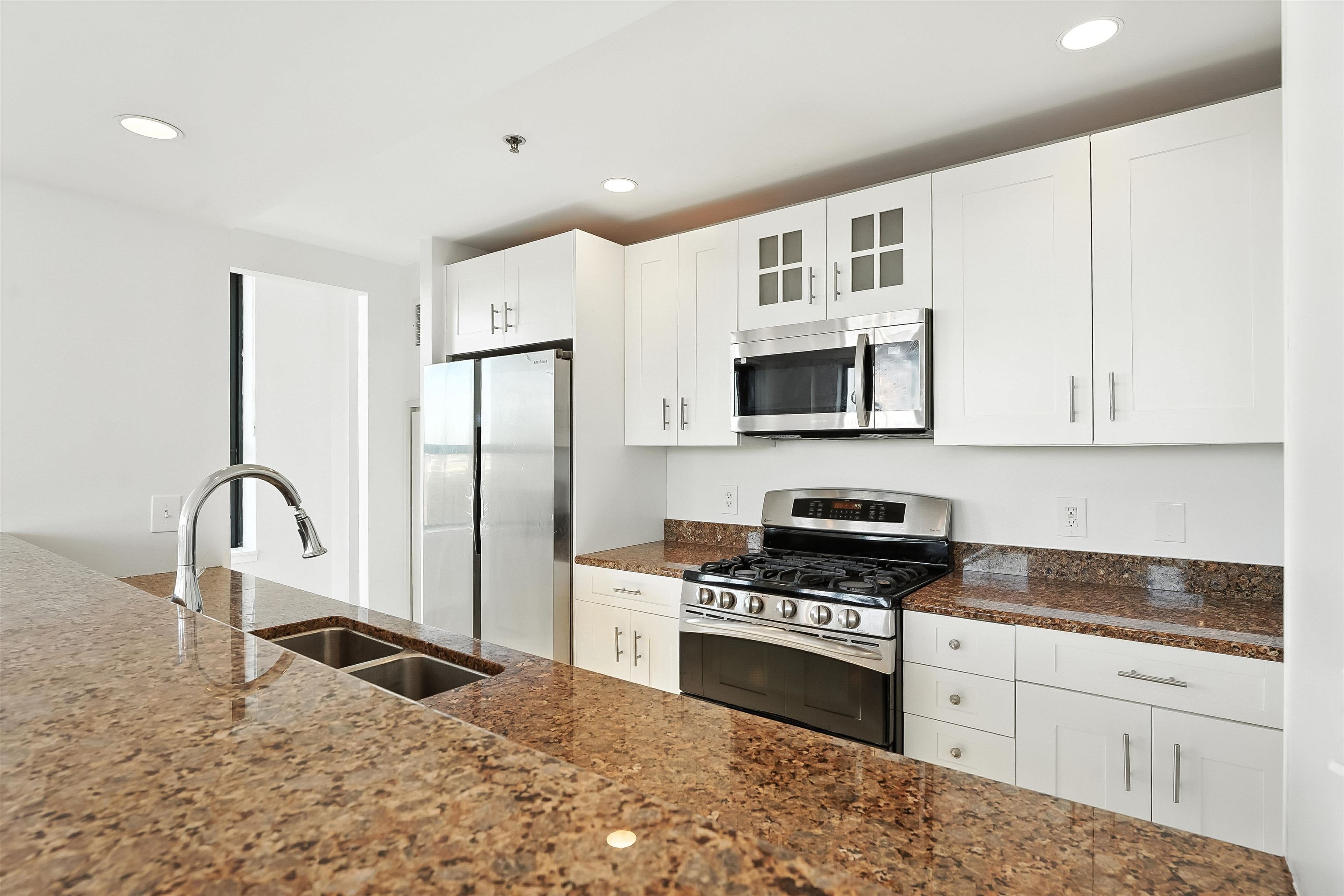 Experience luxury living at its finest in this southwest-facing corner 2 bedroom/ 2 bathroom residence with breathtaking views of NYC, the Hudson River, and Elysian Park. Flooded with natural light, this home offers an open-concept layout with a spacious kitchen, living, and dining areaperfect for both everyday living and entertaining. The chef's kitchen boasts a large breakfast bar with top of the line stainless steel appliances. Each bedroom features its own en-suite bath for maximum comfort and privacy. Located in Hoboken's premier waterfront community, Maxwell Place offers an array of luxury amenities: two pools, two state-of-the-art fitness centers, children's playrooms, rooftop decks, and residents' lounges. Commuting is a breeze with a private shuttle to the PATH, NYC bus service, and the ferry just moments away. One parking space is included. Available Now!