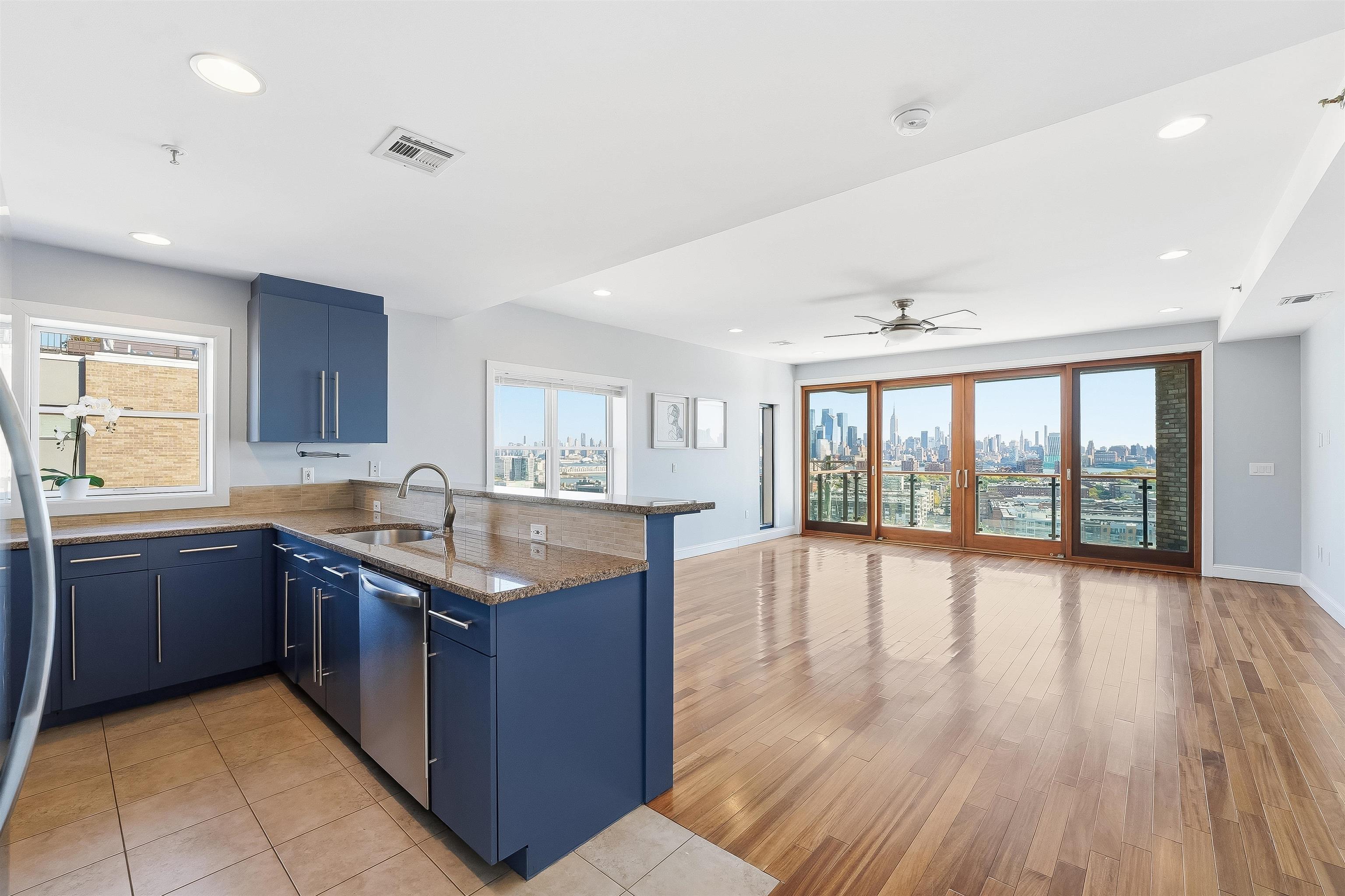 Perched atop the Palisades, this 1, 700 sq. ft. 3BR/2BA home offers panoramic NYC, Hudson River, and Hoboken views. The open layout features a gourmet kitchen with premium SS appliances, spacious living/dining area, and floor-to-ceiling glass doors leading to a private terrace. The primary suite boasts a custom walk-in closet and spa-style bath with Jacuzzi and shower. Additional highlights include in-unit laundry, central air, recessed lighting, garage parking, and elevator access. Located on a quiet cul-de-sac near 3rd & Manhattan, with an NJ Transit bus to NYC and the Congress Street elevator to Hoboken just steps away. Available Now!