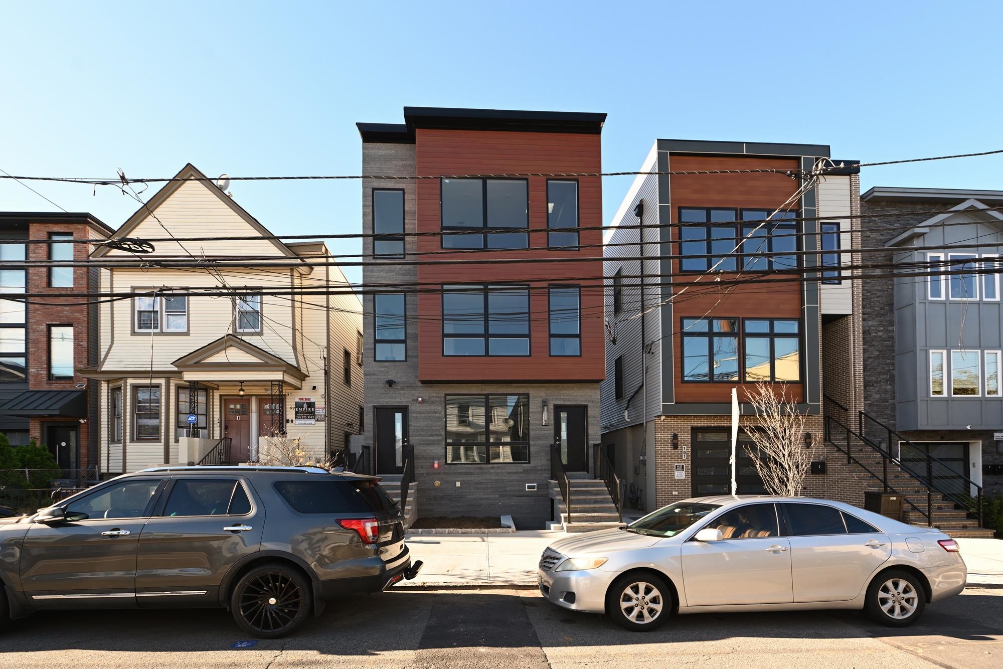 Fully renovation beautiful and spacious three 3b/2b unit located in desirable Jersey City Heights. This sunlit top-floor residence offering 3 spacious bedrooms, 2 full baths with elegant double vanities, and fancy shower systems. Outfitted with brand new Viking stainless steel appliances, custom cabinetry, hardwood floors, and in-unit laundry, this home seamlessly blends luxury and convenience. Extra storage room available in the basement. Located on a peaceful street with easy access to NYC-bound buses and shoppings.