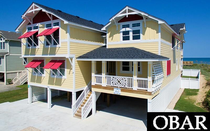 The search for the perfect home is over...the essence of beach life is captured for eternity in Endless Summer! 2020 confirmed rent: $275,320, 28 weeks Your family will enjoy the salt and sand in this chic cottage fit for coastal royalty.  Panoramic views of sky, sea and birds and waves replay over and over through walls of windows throughout the home.  Ninety feet of elevated oceanfront decking showcase the drama of this incredible site. Two floors of living heated space and an elevator make this home extremely livable and comfortable.  The soothing palate of blues and whites and featuring contemporary nautical touches adds to the ambiance inside.  Outside,  shutters, covered porches and craftsman details add appeal to this star of a home. The top floor has an open floor plan features a cathedral ceiling, plenty of windows and an expansive sun deck with weatherproof decking, creating a sanctuary filled with natural light and awe-inspiring views. The great room, dining area, and kitchen are all included in the open layout. The kitchen offers dual appliances includes two refrigerators, two dishwashers, and two ovens. Bedding options on this level include two master suites -- one king and one queen, and a jr. master with a king and the other with a twin bunk set. Central to the mid-level are two spaces built and customized for entertainment. A rec room includes a pool table and foosball table and sports bar with kitchenette, and an adjacent cinema-style home theater features tiered-seating for an epic movie night! Three uniquely appointed master suites (two kings and one queen) and two jr. master bedrooms, one with a king and the other with a twin bunk set, round out this level. The carport offers convenient covered parking, and the lower level entrance includes access to the elevator, which travels to all levels. An outdoor sitting area includes a half bath and ping pong table. Splash for hours in the private heated pool or soak in the hot tub.  The pool area is spacious and landscaped.  A private walkway leads directly from the pool to the beach. Investors will enjoy lower expenses with this home due to a number of factors. The outstanding site has low erosion, and the thoughtful plan uses space efficiently for maximum enjoyment and appeal.  Quality materials and craftsmanship will keep guest happy for years to come.