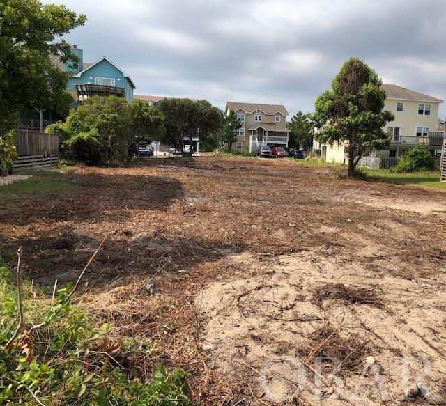 Only two vacant lots remain in Crown Point...Priced BELOW 2017 tax assessment. Direct Beach Access! Crown Point quiet, peaceful and private. Just a short walk to TimBuck II and Monteray Plaza. Enjoy shopping, dining, entertainment and fun that Corolla has to offer, including go-karts, mini-golf, movie theater and New Adventure Park. Crown Point has private beach access, community pool and tennis courts.  Custom Build your beach home you have always dreamed about. Municipal water and septic available. This is a great opportunity to build your Oceanside investment  in Corolla!