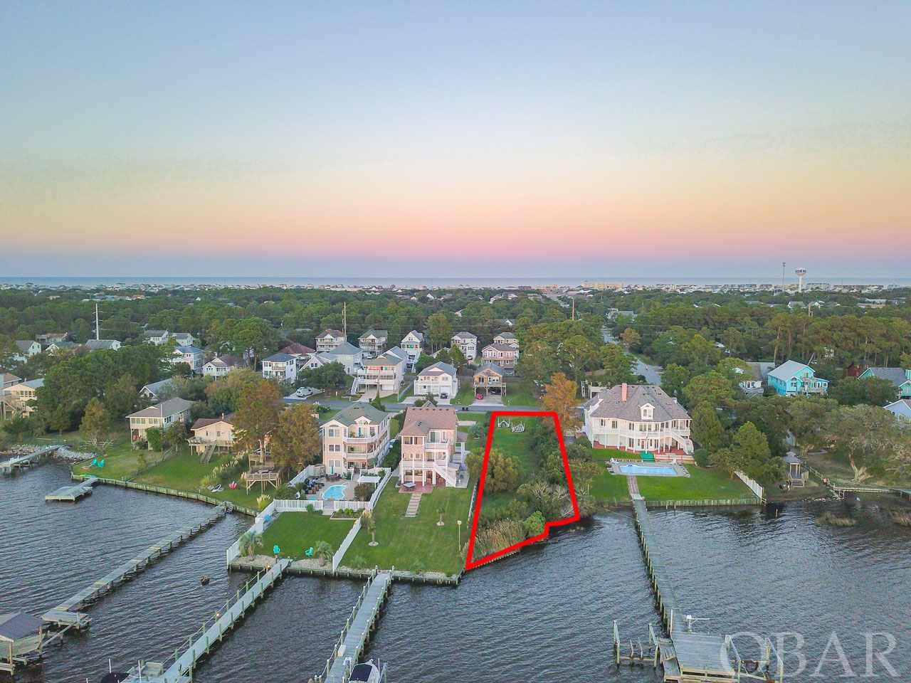 Rare Opportunity to own a Soundfront lot on Bay Drive!  The lot offers sweeping views of the sound and is the perfect location for your new soundfront home and dock.  The current owners added a bulkhead and 2 ft of fill.  The lot is ready to be built on!  Bay Drive is a centrally located and offers a multi-use path, gazebo, and public boat ramp.