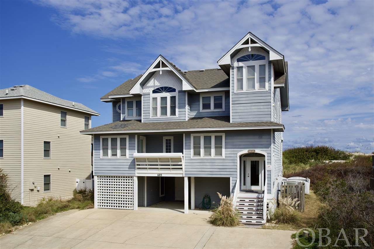 PROJECTED TO DO OVER $163,000 IN ANNUAL RENTAL INCOME! Switching to Twiddy Rental program for 2021. Well appointed and spacious 7 bedroom oceanfront home (over 3600 sq ft!) in Corolla, complete with a large 11x24 private pool, hot tub, game room, and two living areas. New kitchen appliances, and new interior paint! With 5 master bedrooms, great outdoor deck space, and beautiful ocean views, this property makes a great rental investment. Convenient to grocery and shopping in Corolla, and just across from the Currituck Club Golf course!