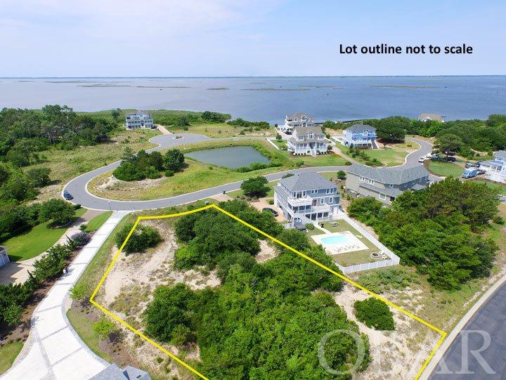 VIEWS! VIEWS! VIEWS! This magnificent lot is located on the former site of the Historic Shooting Club at The Currituck Club. Build your dream house on this large, elevated homesite to take advantage of the incredible ocean, sound, pond and golf course views! Included in the sale are a few decorative bricks from the original Hunt Club property which will make for a great conversation piece about your new home! Located toward the Southern end of The Currituck Club results in a short walk / drive / or trolley ride to the beautiful beaches of Corolla! The Currituck Club is the Outer Banks' premier gated community offering security, front guard gate, free Trolley to the beach in season, 18 hole championship Rees Jones designed Golf Course with pro shop, grill, lighted pedestrian paths, basketball and volleyball courts, 5 outdoor pools with kiddie pools and bathhouses, picnic areas, 7 tennis courts (4 are lighted), playground area, fully equipped Fitness Center with game room and billiards, and a surf shack at the beach in season.