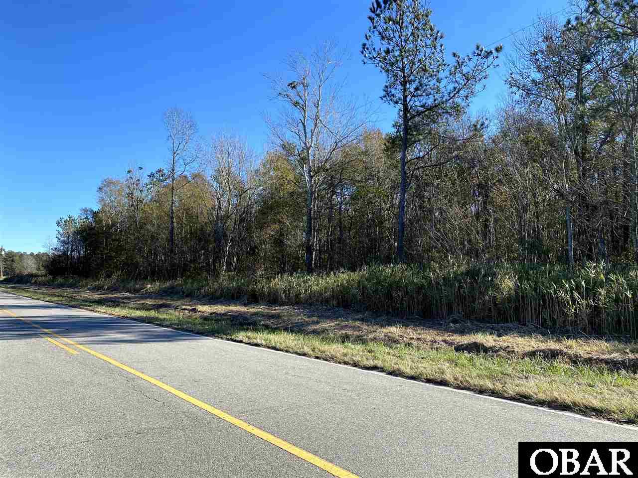 5.5 acres in Tyrrell County. Priced below tax value. Tons of privacy and no restrictions! Build or bring in a mobile home. Located approximately 45 minutes to the Outer Banks, 30 minutes to Manteo. Tyrrell county boasts amazing opportunities for wildlife viewing, hunting and fishing. Being sold as part of a larger tract.  Taxes is an approximate calculation of a portion of the entire track.