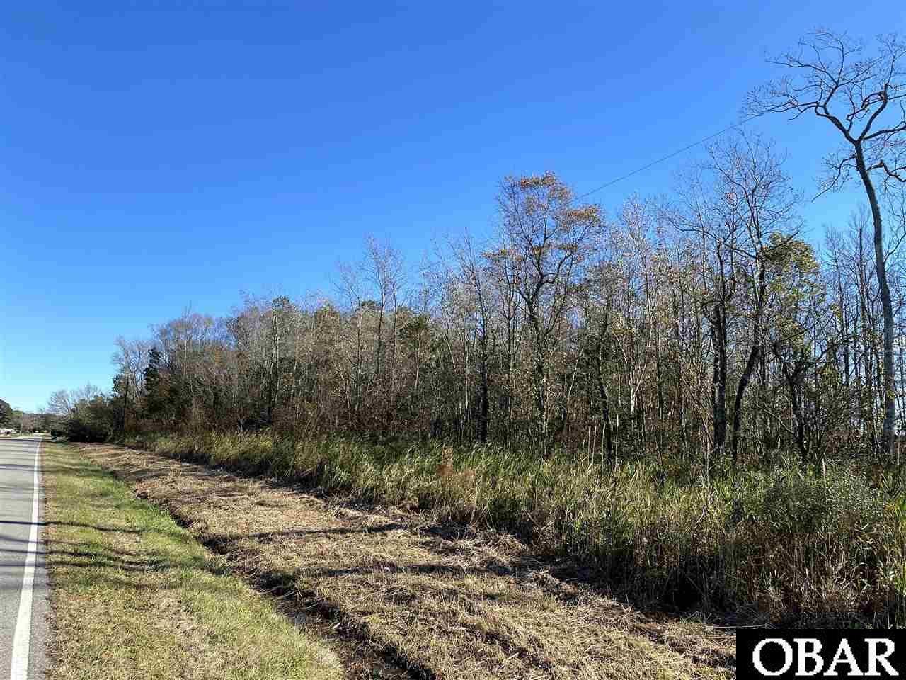 8 acres in Tyrrell County. Priced below tax value. Tons of privacy and no restrictions! Build or bring in a mobile home. Located approximately 45 minutes to the Outer Banks, 30 minutes to Manteo. Tyrrell county boasts amazing opportunities for wildlife viewing, hunting and fishing. Being sold as part of a larger tract.  Taxes is an approximate calculation of a portion of the entire track.