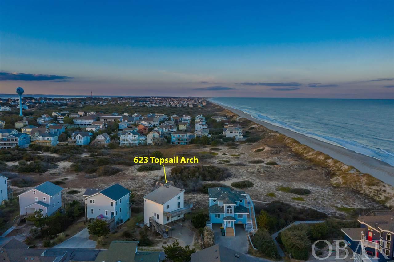 Perfect location for your dream beach home which will have beautiful views spanning over vast, permanent open space in X-FLOOD ZONE! Easy walk to the beach, centrally located in Corolla with easy access to shopping and restaurants. If you were looking for a blank canvas to customize, that comes with sweeping views, this is the one! Estimates for tearing down the current structure are available. Rental projection estimates for a 6-bedroom home are included in the associated documents. Call for details.