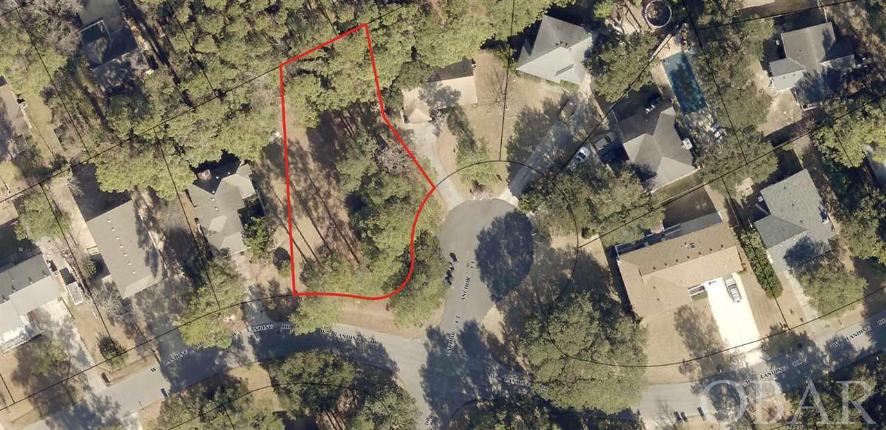 Rare opportunity to purchase a large, 10,000 square feet, lot in this desirable Kill Devil Hills neighborhood.  Located at the corner of Landing Drive and Anchor Court, you will love the proximity to shopping, restaurants, The Wright Brothers Memorial, Bay Drive, which has a multi use path, sound accesses and a public boat ramp.  This area also has the advantage of a traffic signal for ease of getting to the beach.   This is only the third lot to be listed in The Landing or First Flight Village in the past two years, so don't delay.