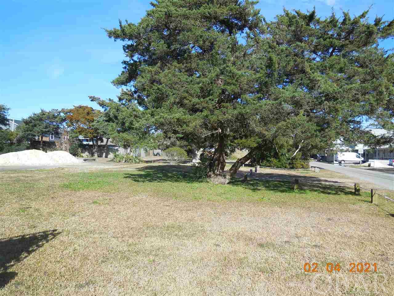 A 5,330 sq. ft. corner lot in Live Oak Village, a new 7 lot subdivision in the heart of Ocracoke Island. Walking distance to great restaurants, shops, galleries, Silver Lake harbor and The Ocracoke Coffee Shop. Conveys with a 4 bedroom septic permit and a 4 bedroom water meter. Restrictive covenants in place to retain the historical charm and quaintness of Ocracoke Village. Start planning your Ocracoke dream house! Taxes are an estimate only. Currently being taxed as one large parcel.