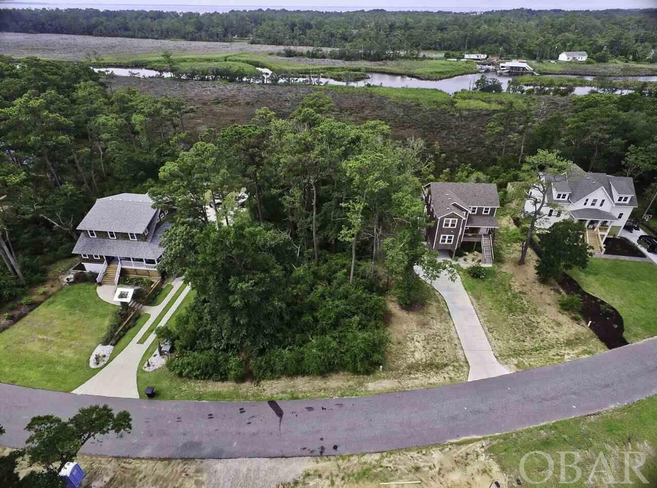 Over one acre of property on Little Colington Island extending all the way to the Colington Cut Canal. Sunrise Crossing is an upscale, quiet Community. This homesite is a must see!